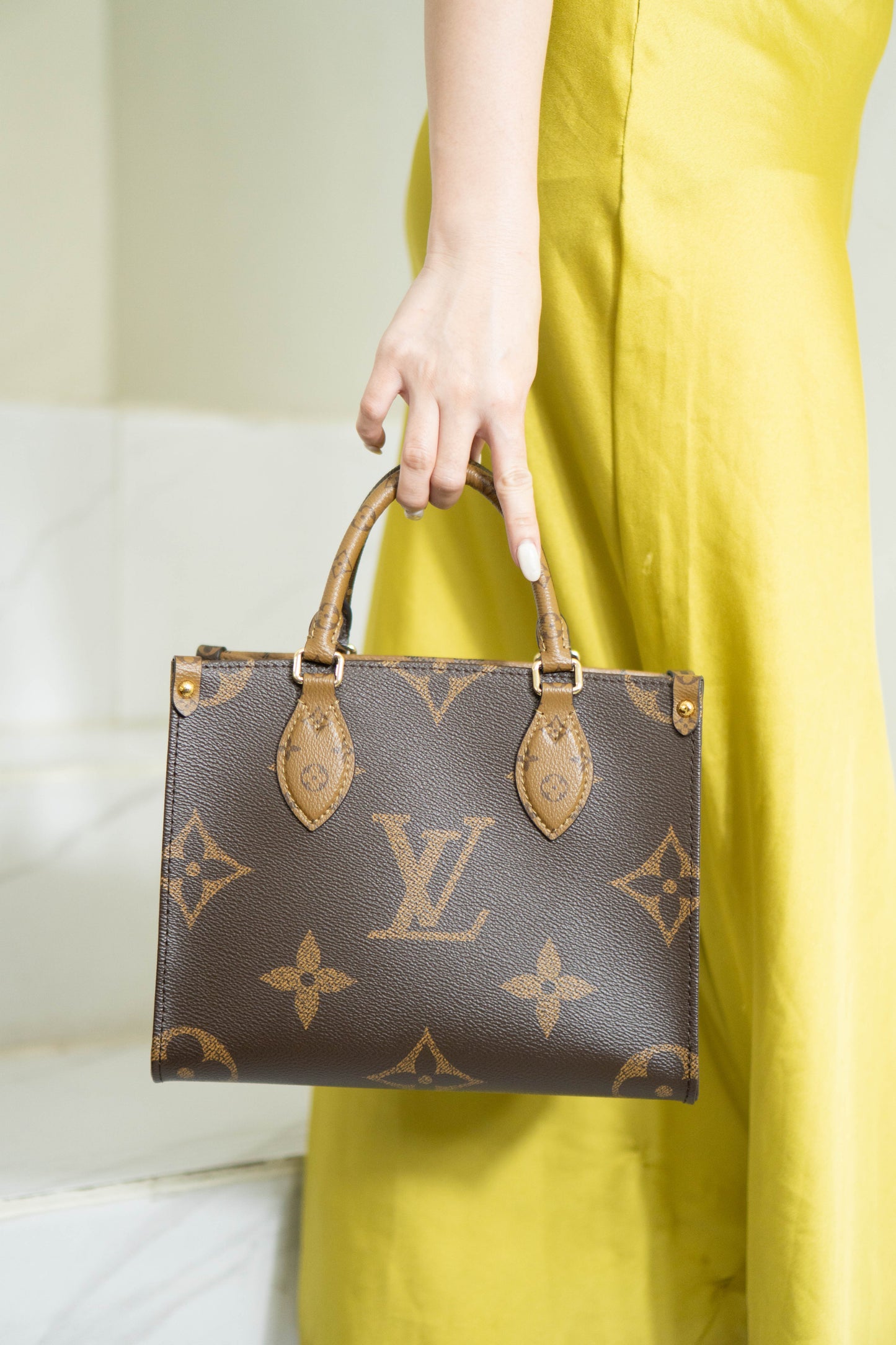 OnTheGo PM in Monogram & Reverse Monogram With Gold Hardware