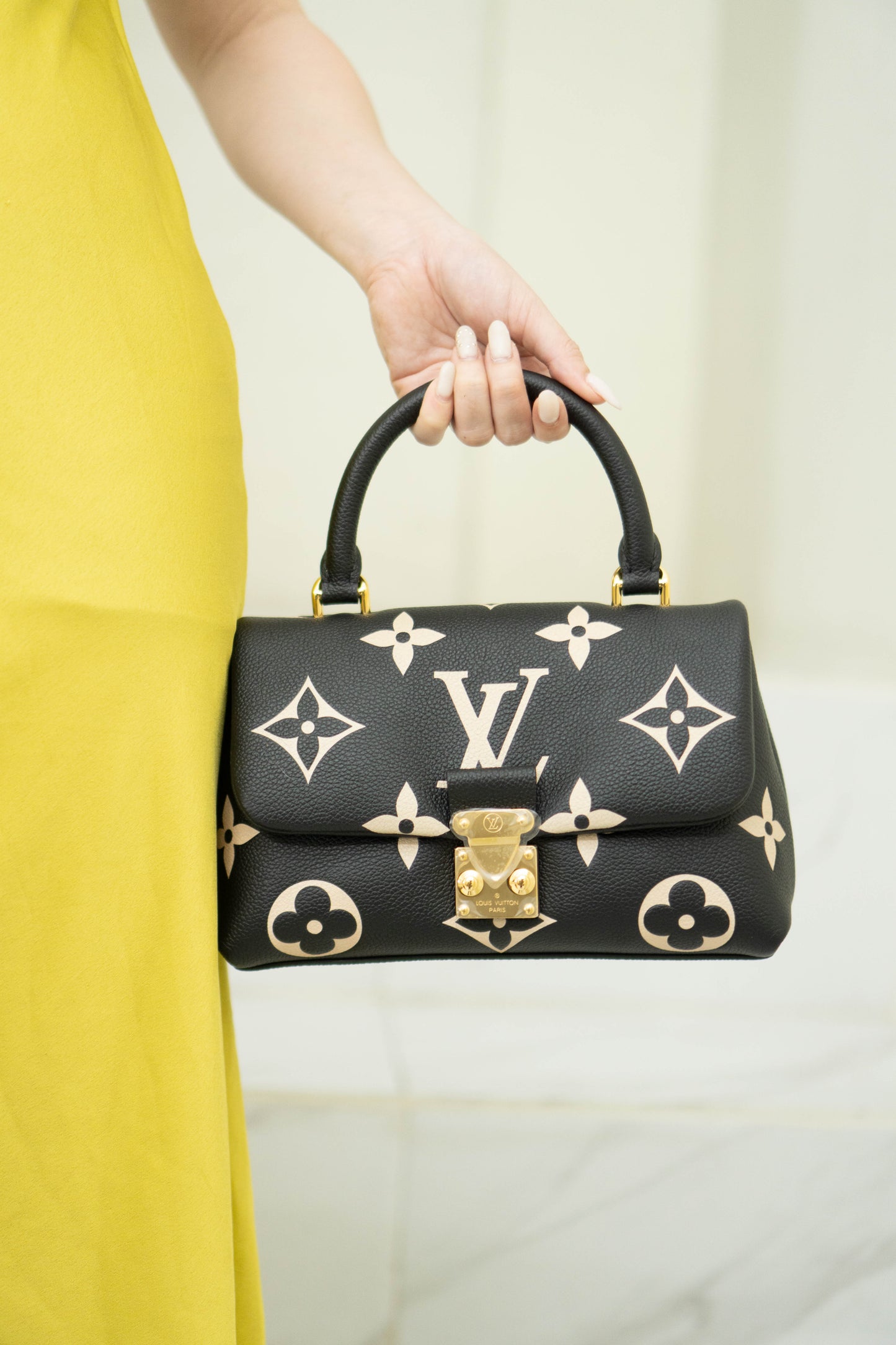 Madeleine BB in Black Bicolor Monogram Empreinte Leather in Gold Hardware