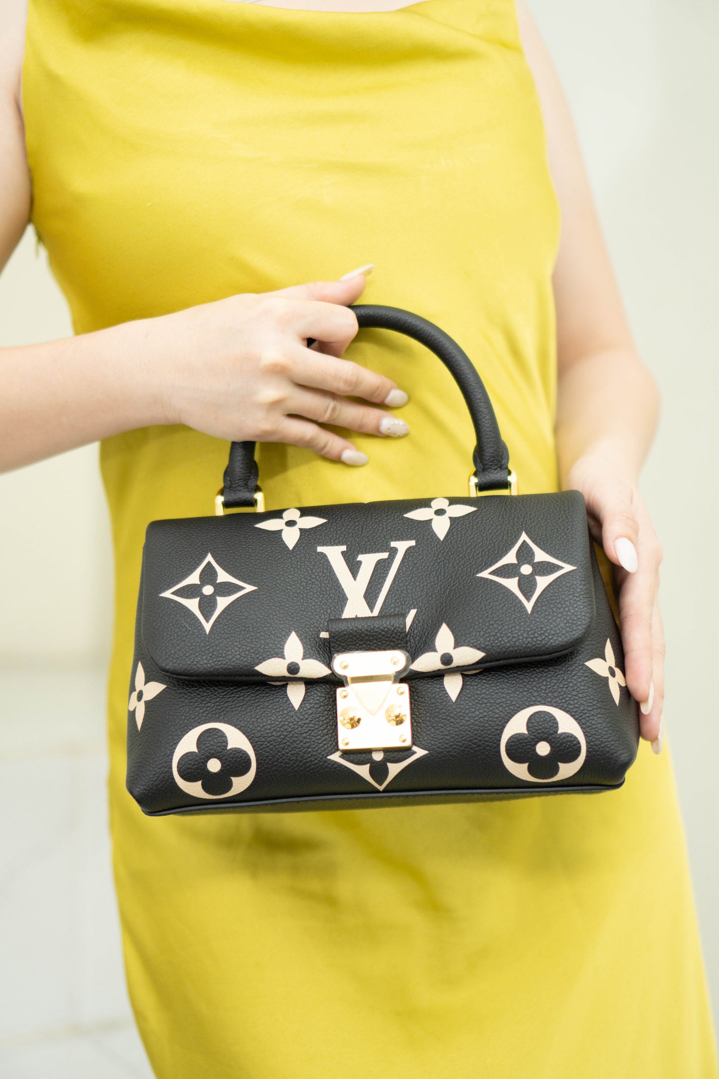Madeleine BB in Black Bicolor Monogram Empreinte Leather in Gold Hardware