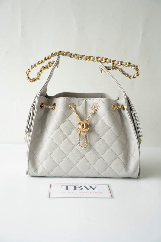 C25 Small Drawstring Chain Bag – Light Gray Caviar Leather with Gold Hardware