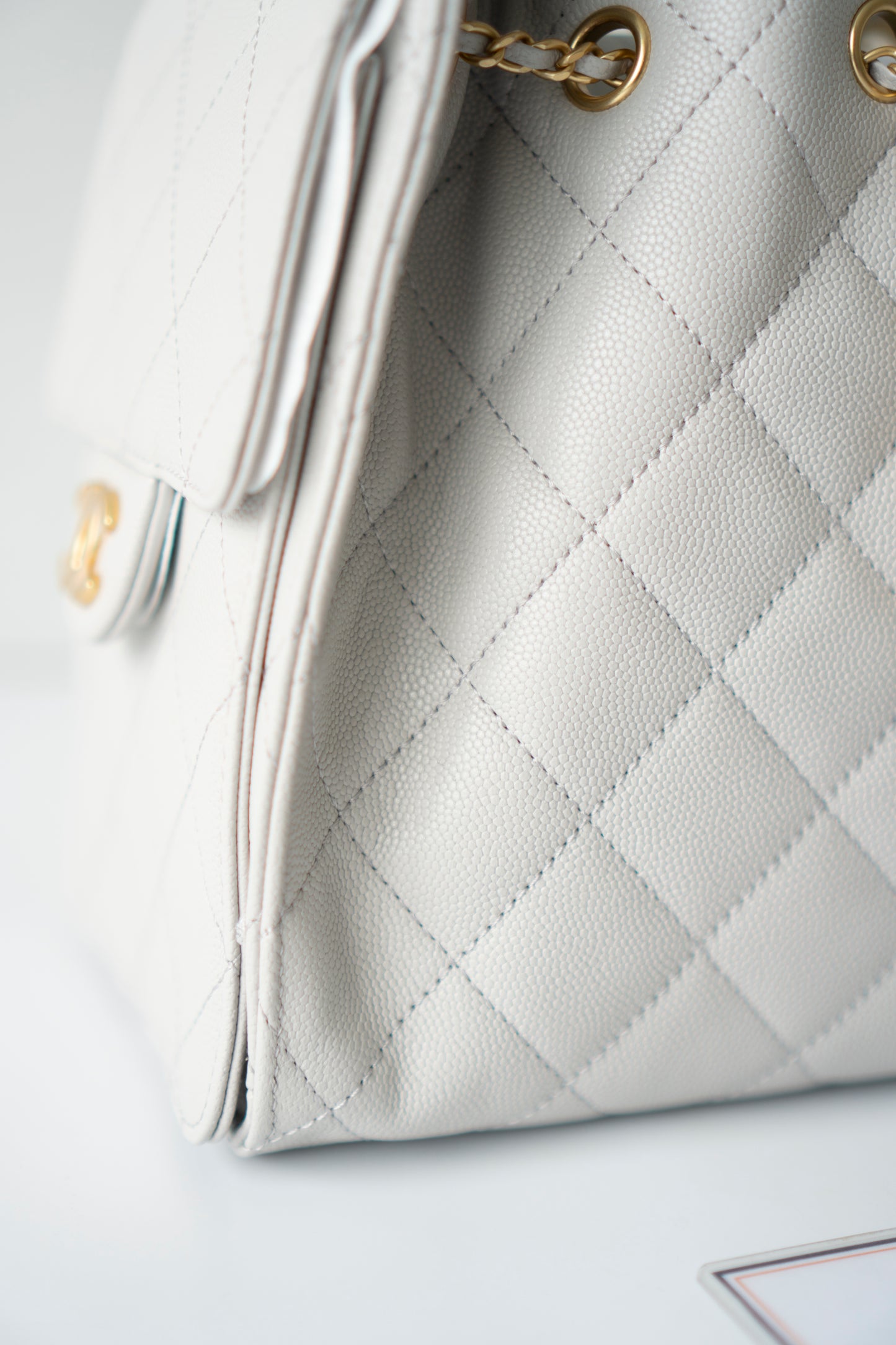 C25 Small Drawstring Chain Bag – Light Gray Caviar Leather with Gold Hardware