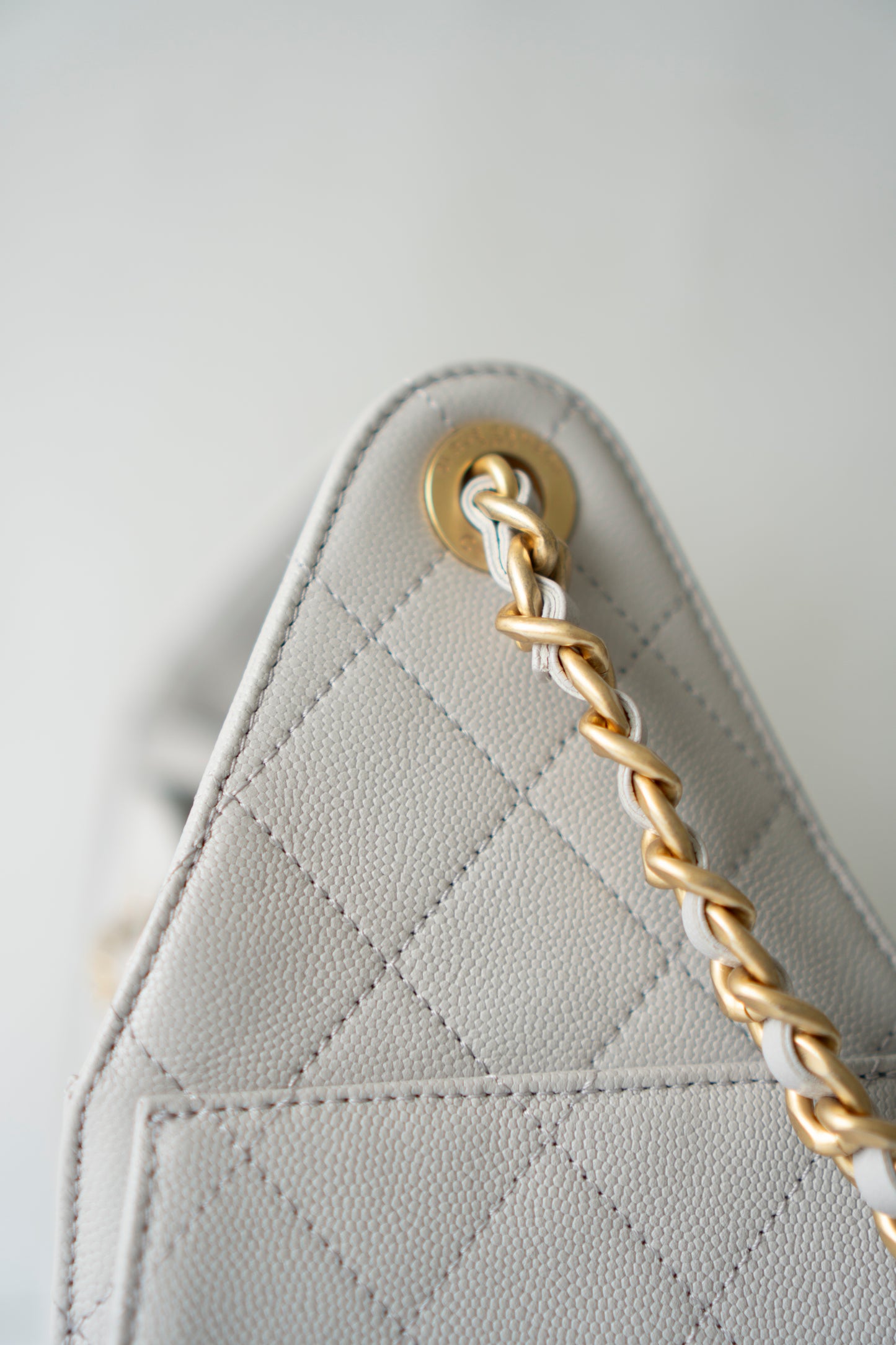 C25 Small Drawstring Chain Bag – Light Gray Caviar Leather with Gold Hardware