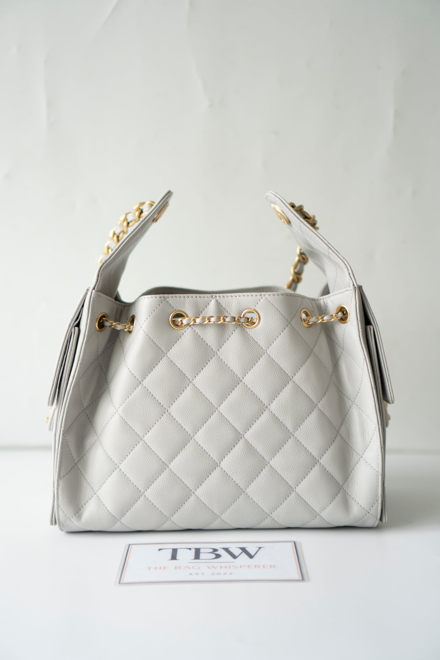 C25 Small Drawstring Chain Bag – Light Gray Caviar Leather with Gold Hardware