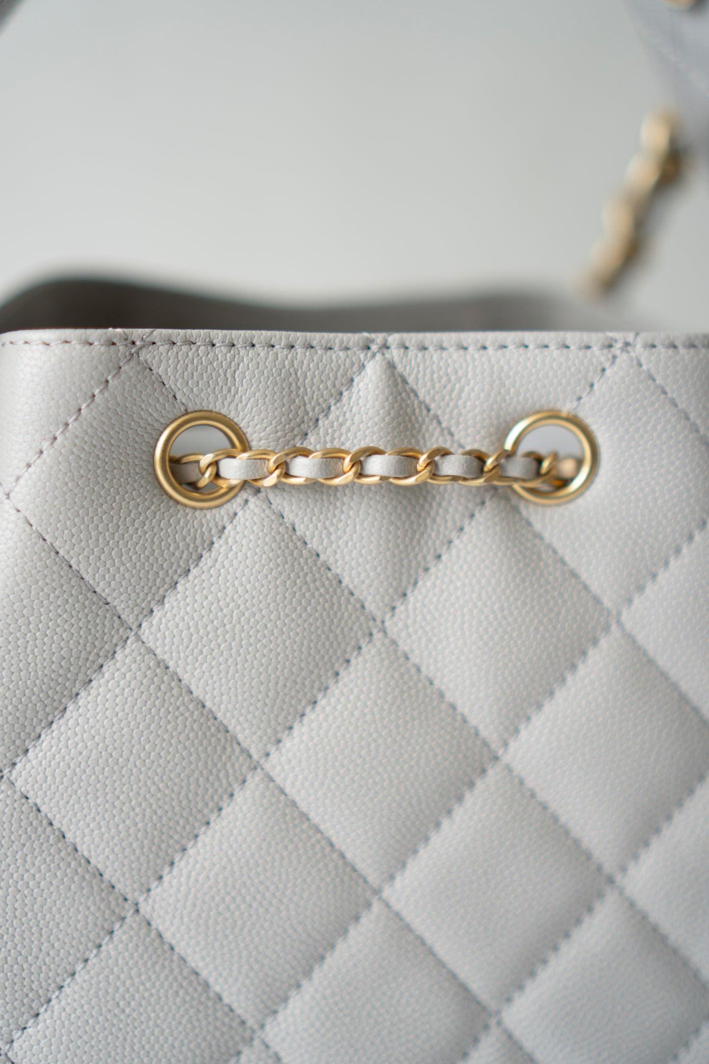 C25 Small Drawstring Chain Bag – Light Gray Caviar Leather with Gold Hardware
