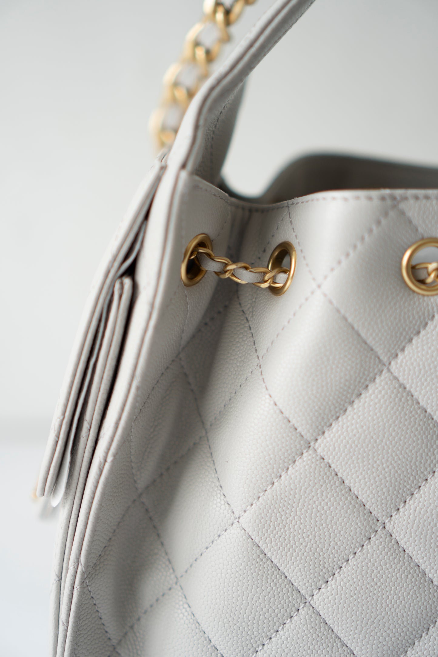 C25 Small Drawstring Chain Bag – Light Gray Caviar Leather with Gold Hardware