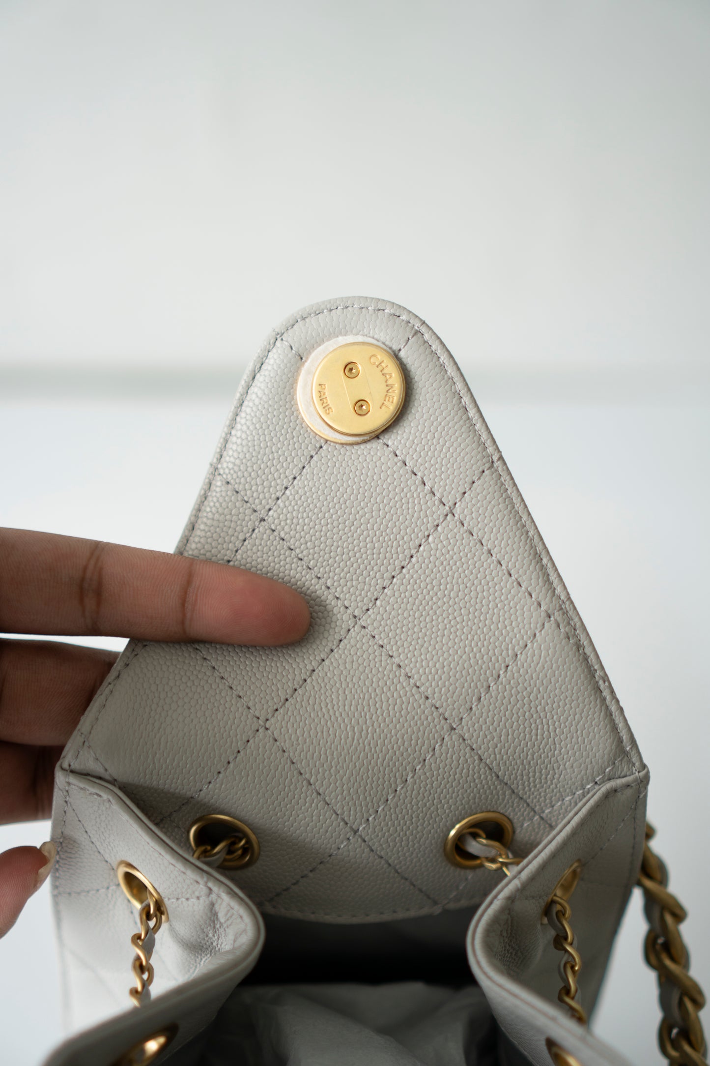 C25 Small Drawstring Chain Bag – Light Gray Caviar Leather with Gold Hardware