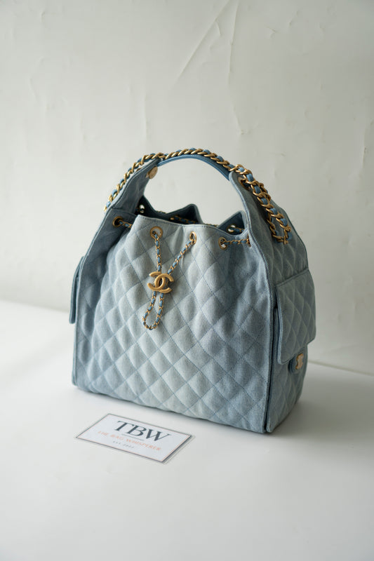 C25 Medium Drawstring Chain Bag – Washed Denim with Gold Hardware
