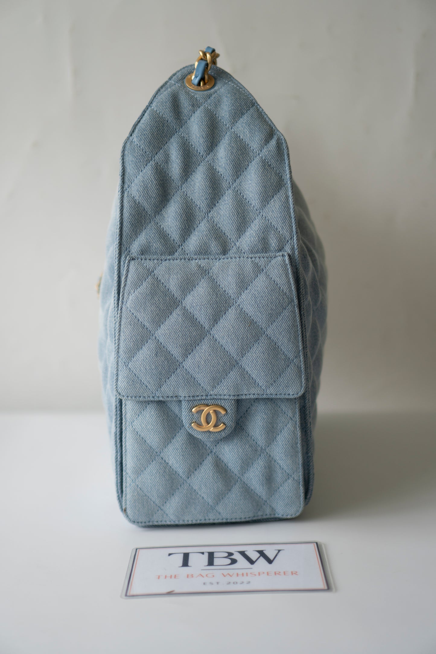 C25 Medium Drawstring Chain Bag – Washed Denim with Gold Hardware
