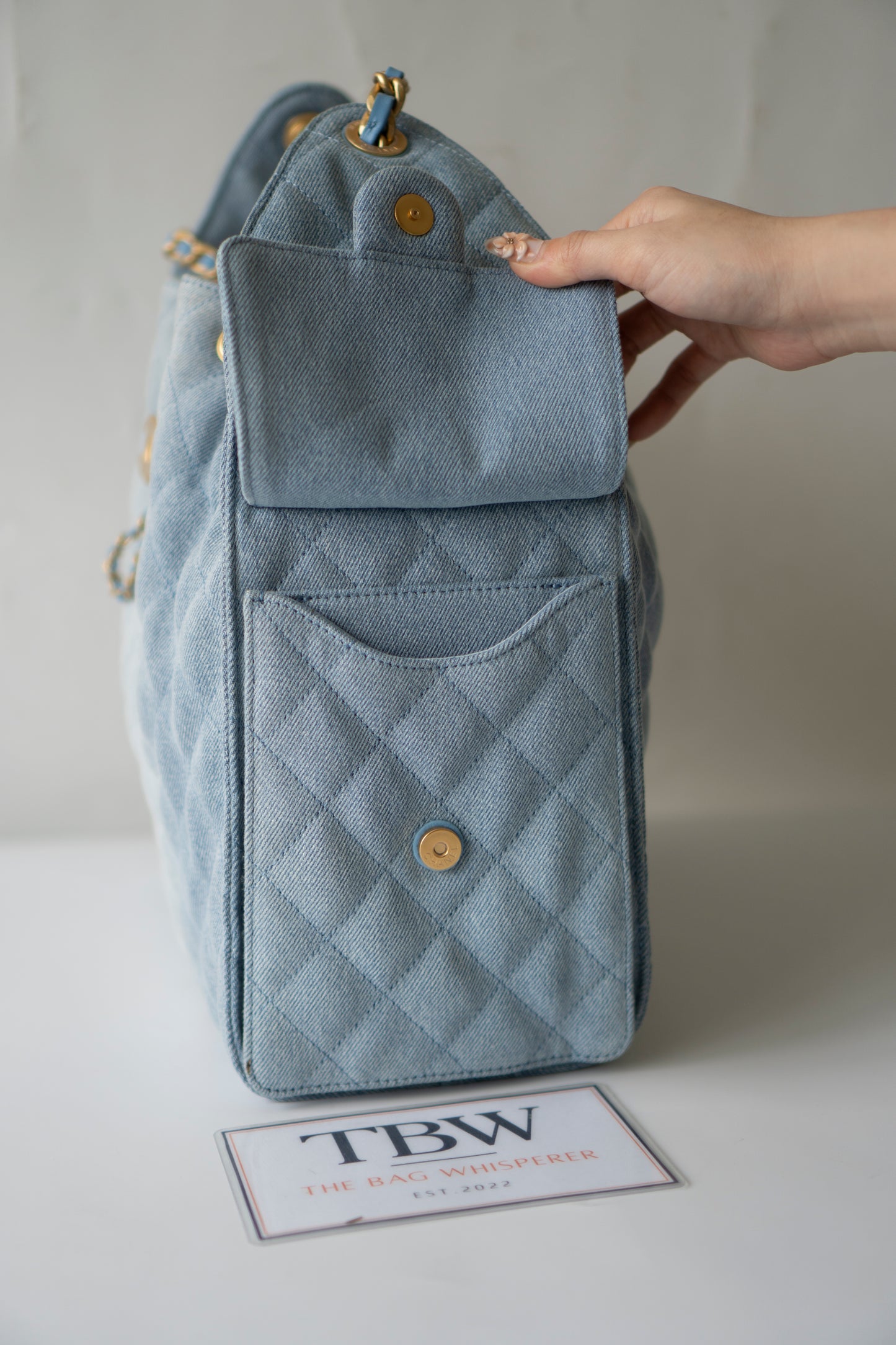C25 Medium Drawstring Chain Bag – Washed Denim with Gold Hardware