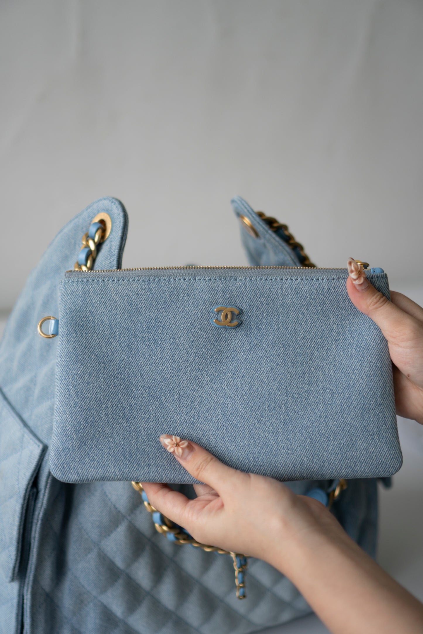 C25 Medium Drawstring Chain Bag – Washed Denim with Gold Hardware