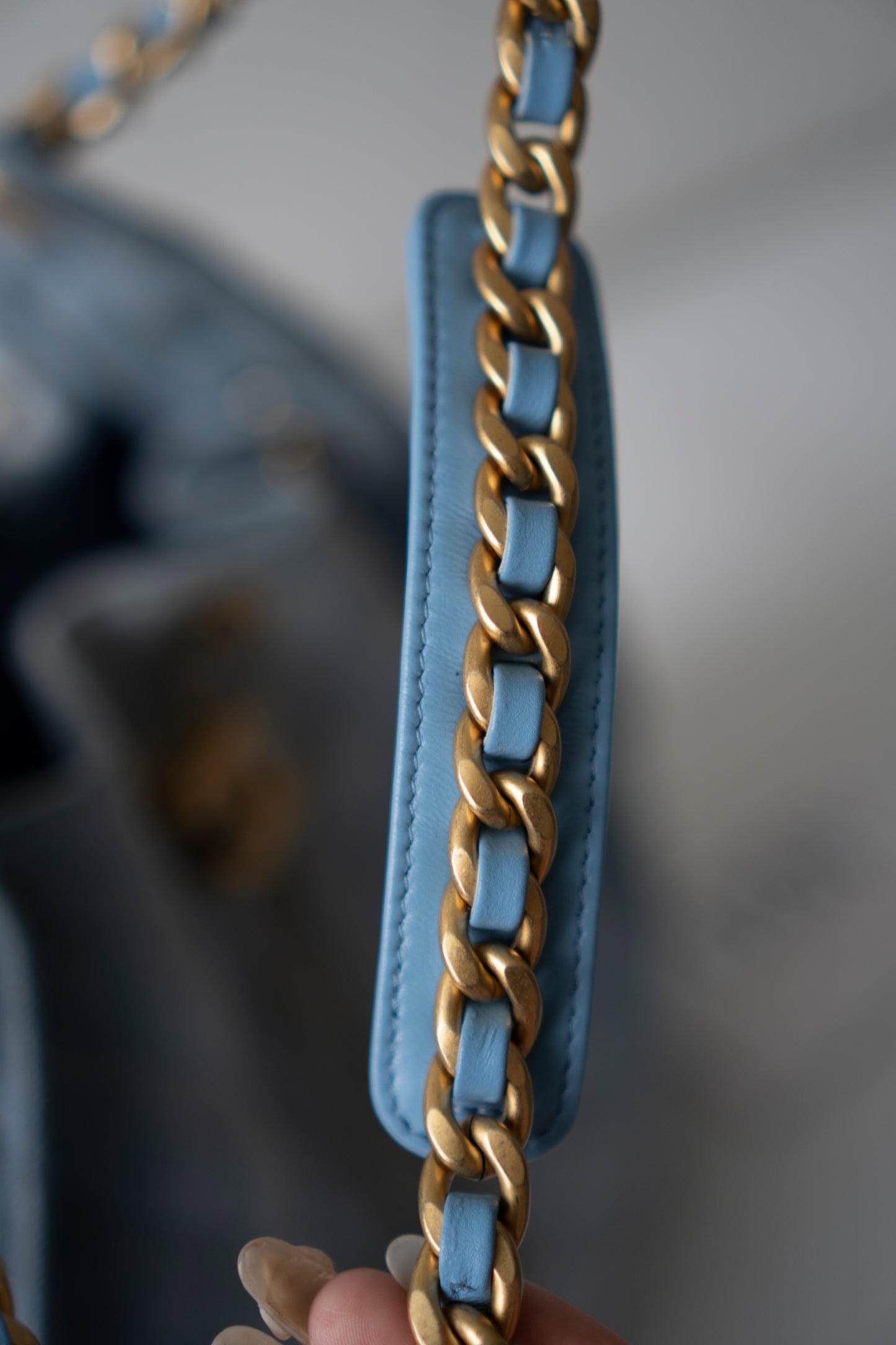 C25 Medium Drawstring Chain Bag – Washed Denim with Gold Hardware
