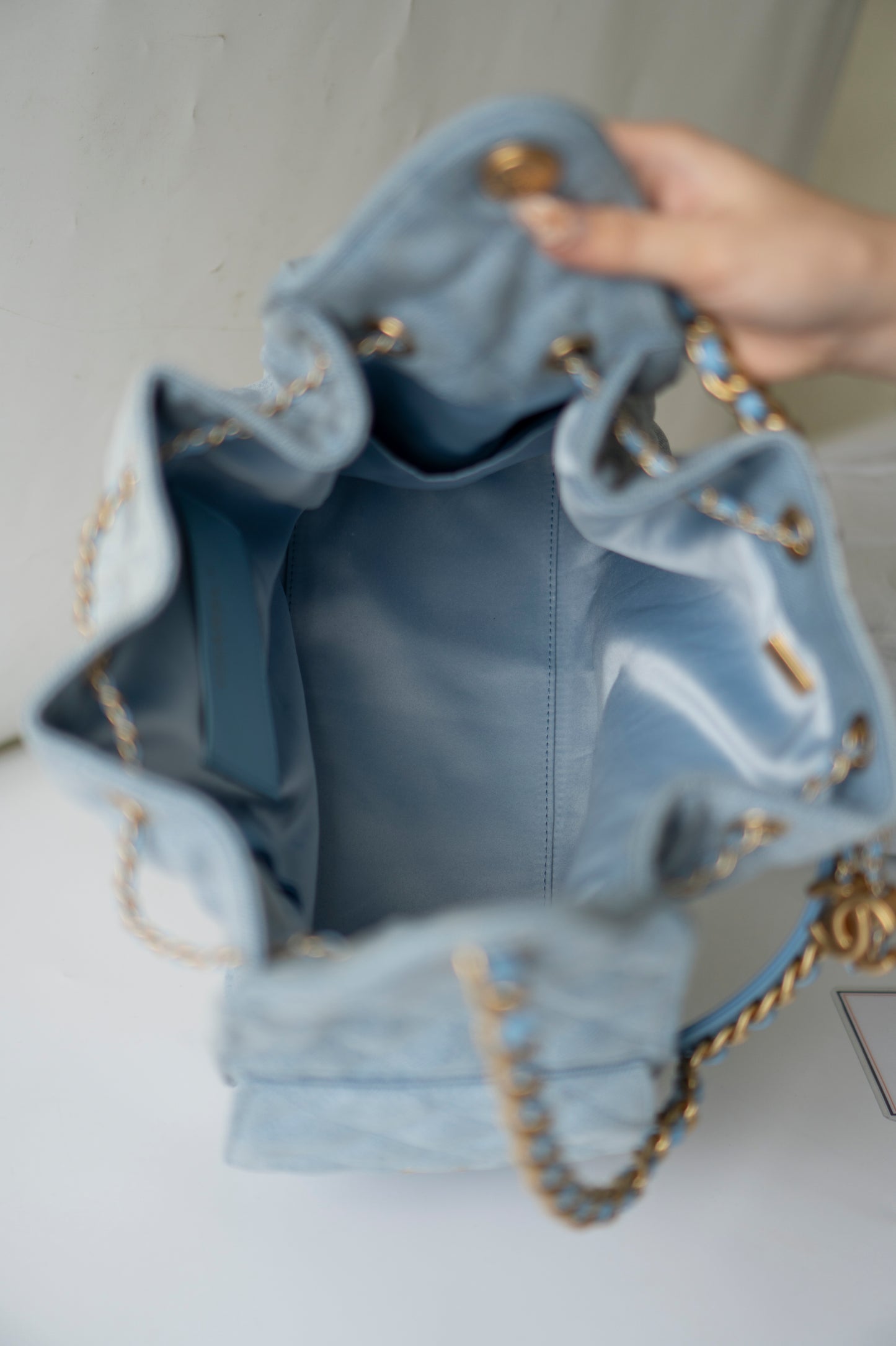 C25 Medium Drawstring Chain Bag – Washed Denim with Gold Hardware