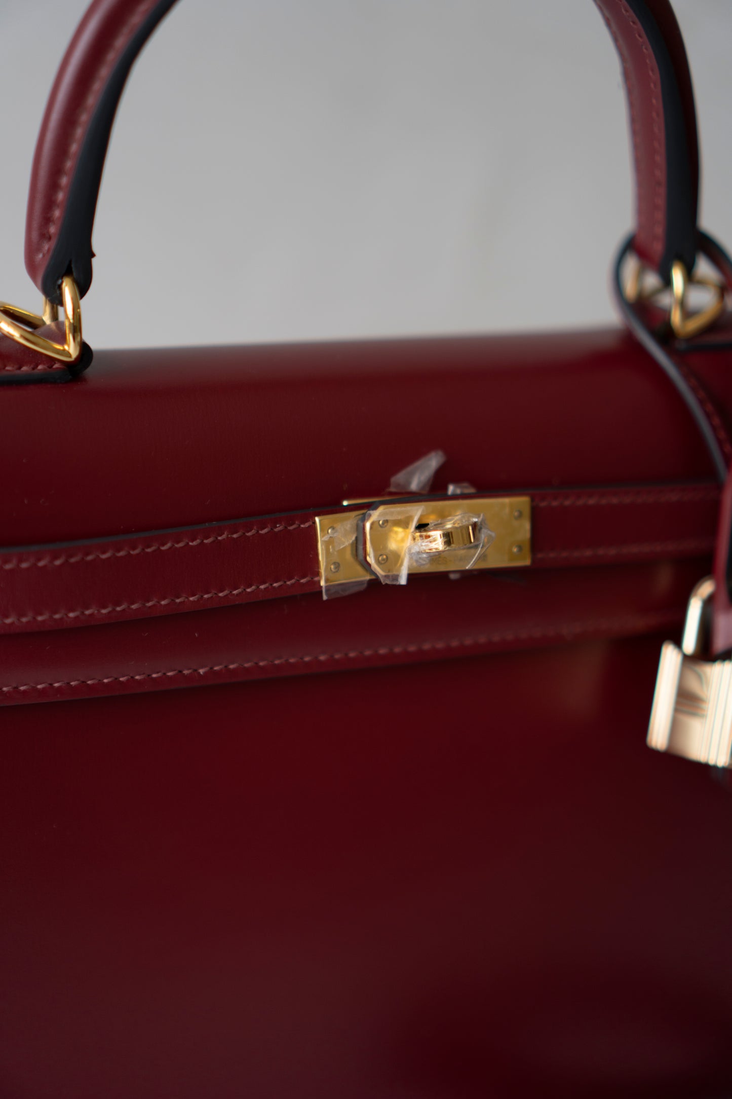 KL 25 – Rouge H Box Leather with Gold Hardware