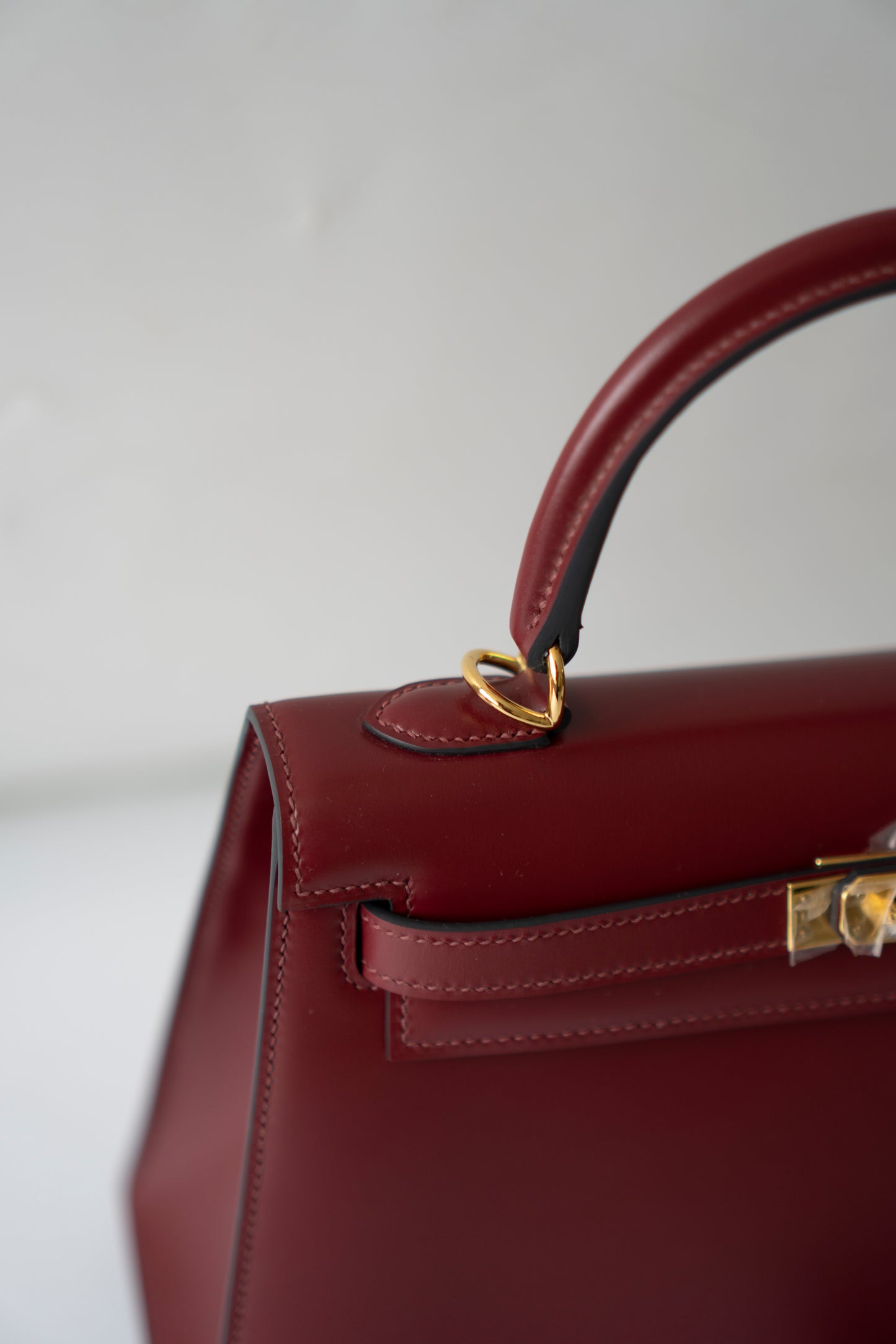 KL 25 – Rouge H Box Leather with Gold Hardware