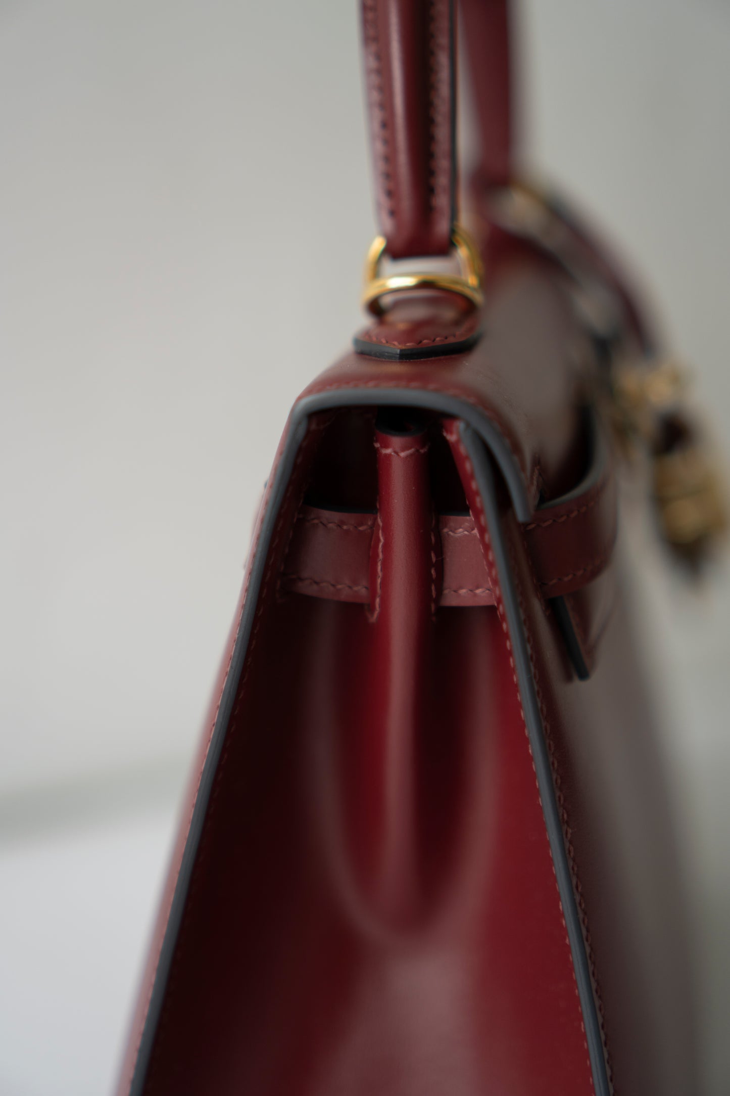 KL 25 – Rouge H Box Leather with Gold Hardware