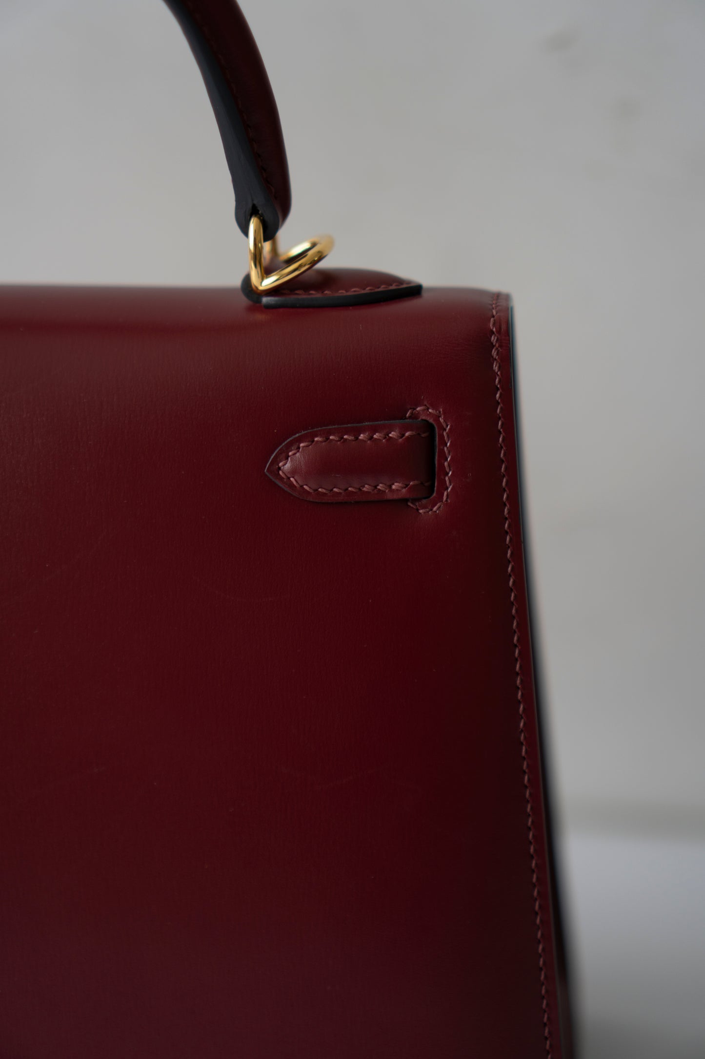 KL 25 – Rouge H Box Leather with Gold Hardware