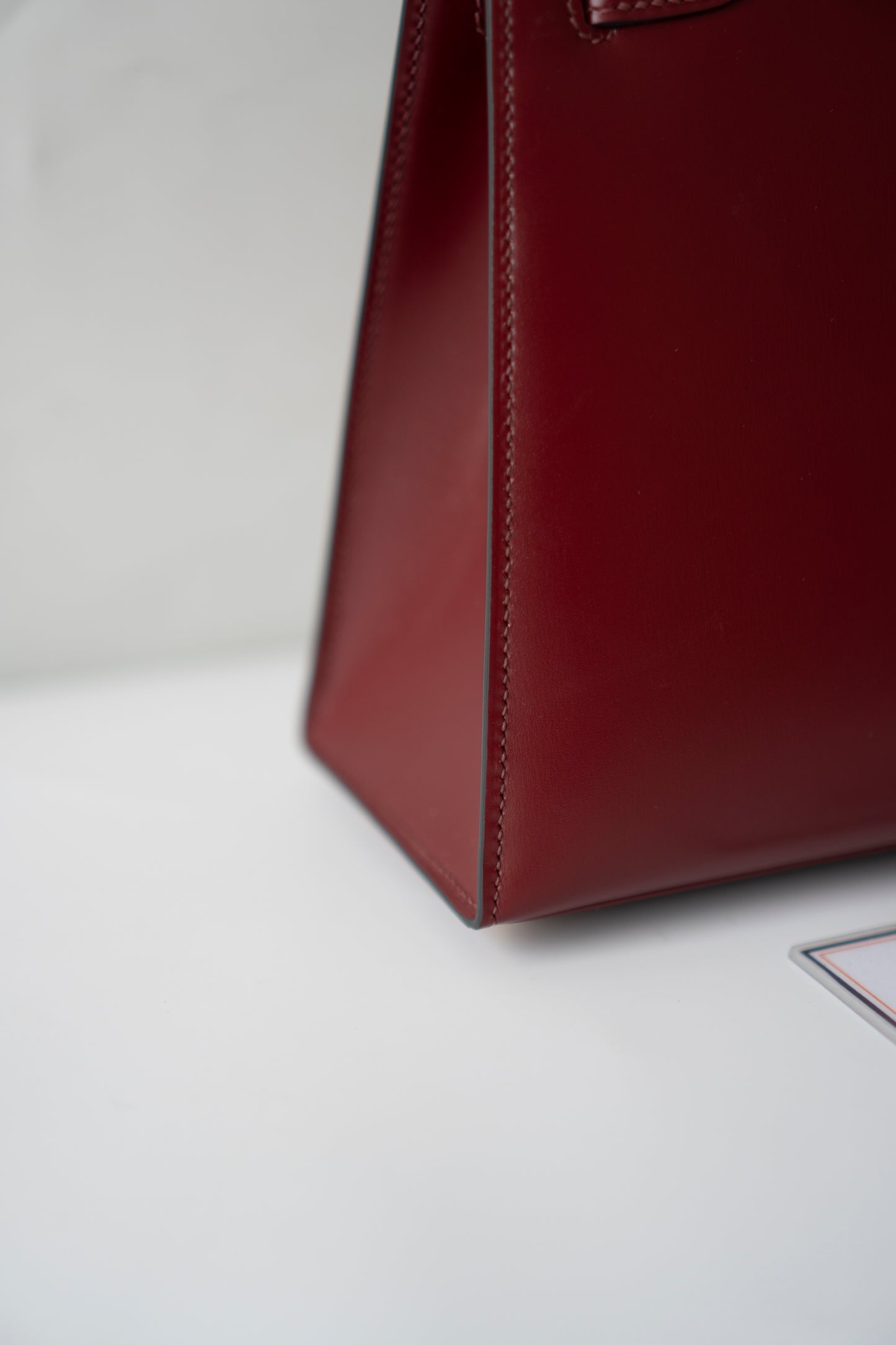 KL 25 – Rouge H Box Leather with Gold Hardware