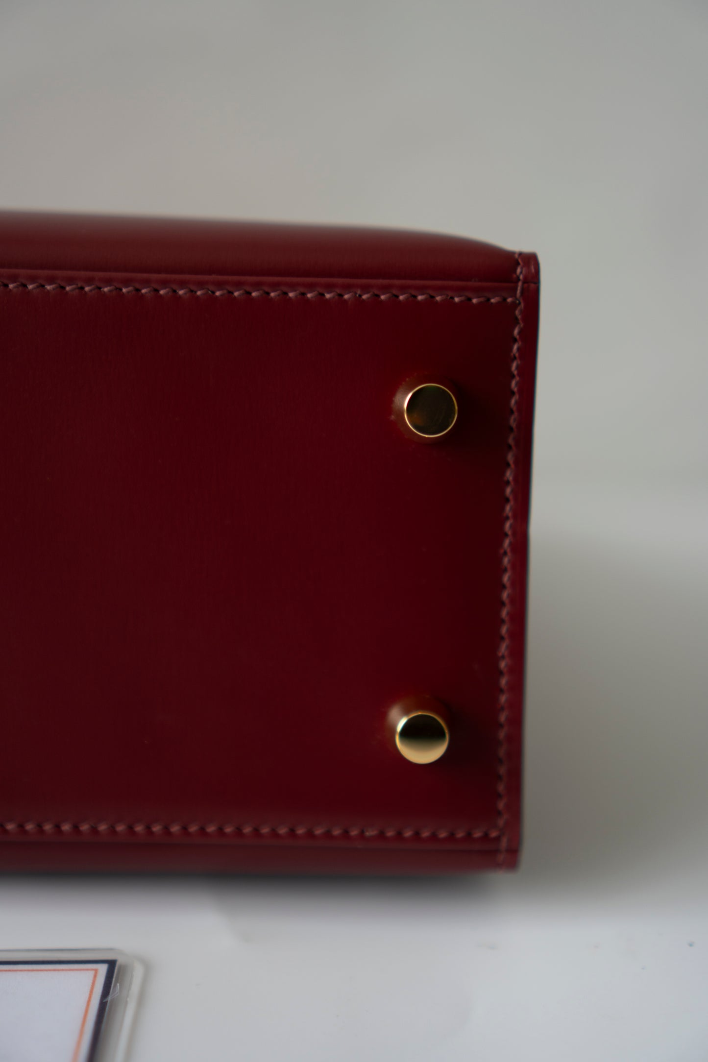 KL 25 – Rouge H Box Leather with Gold Hardware