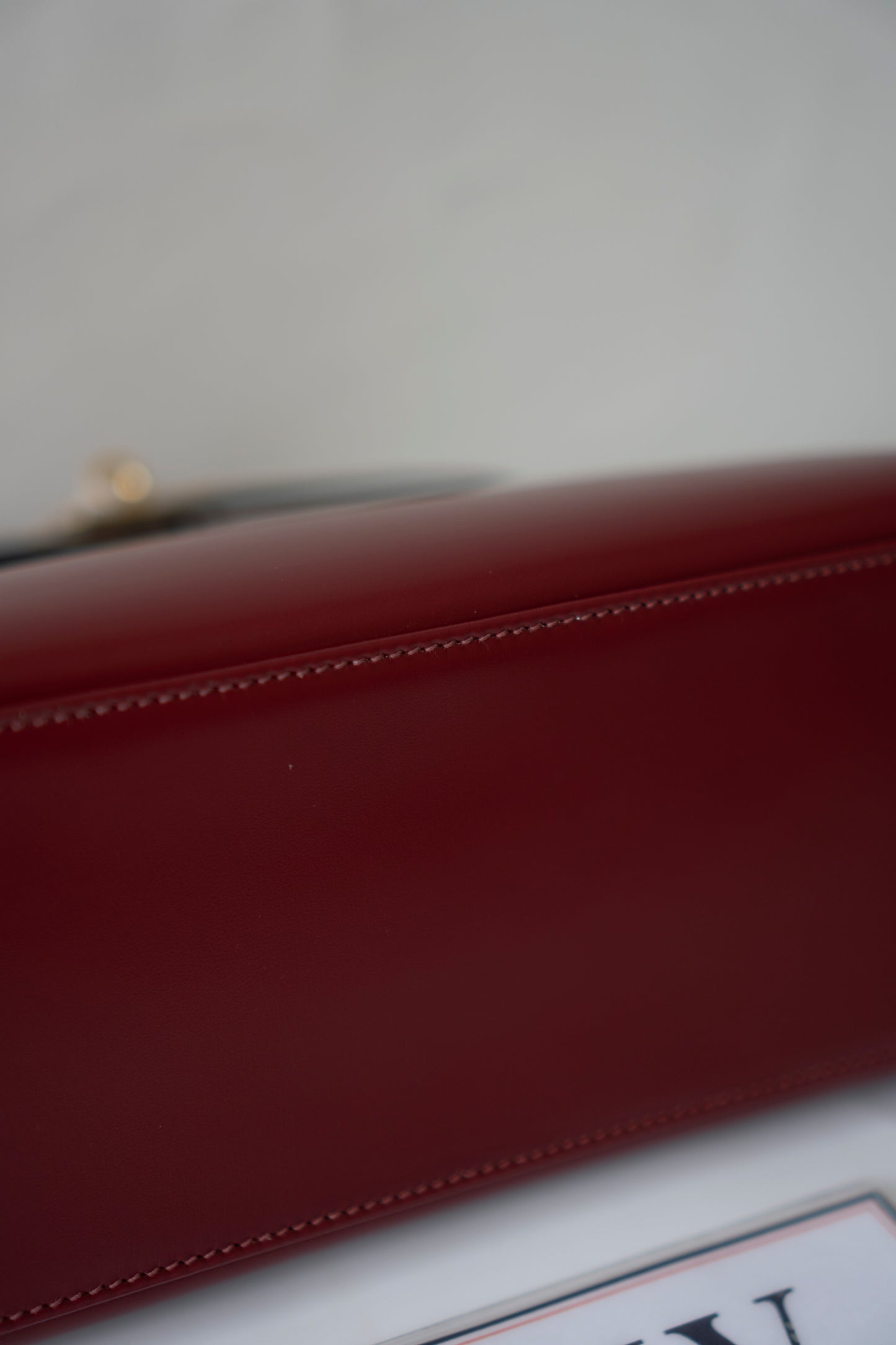 KL 25 – Rouge H Box Leather with Gold Hardware