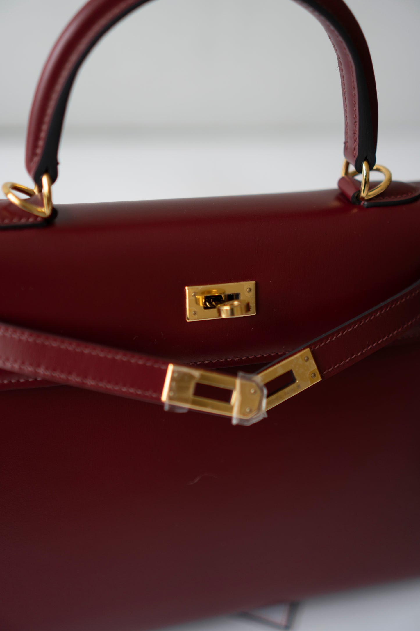 KL 25 – Rouge H Box Leather with Gold Hardware