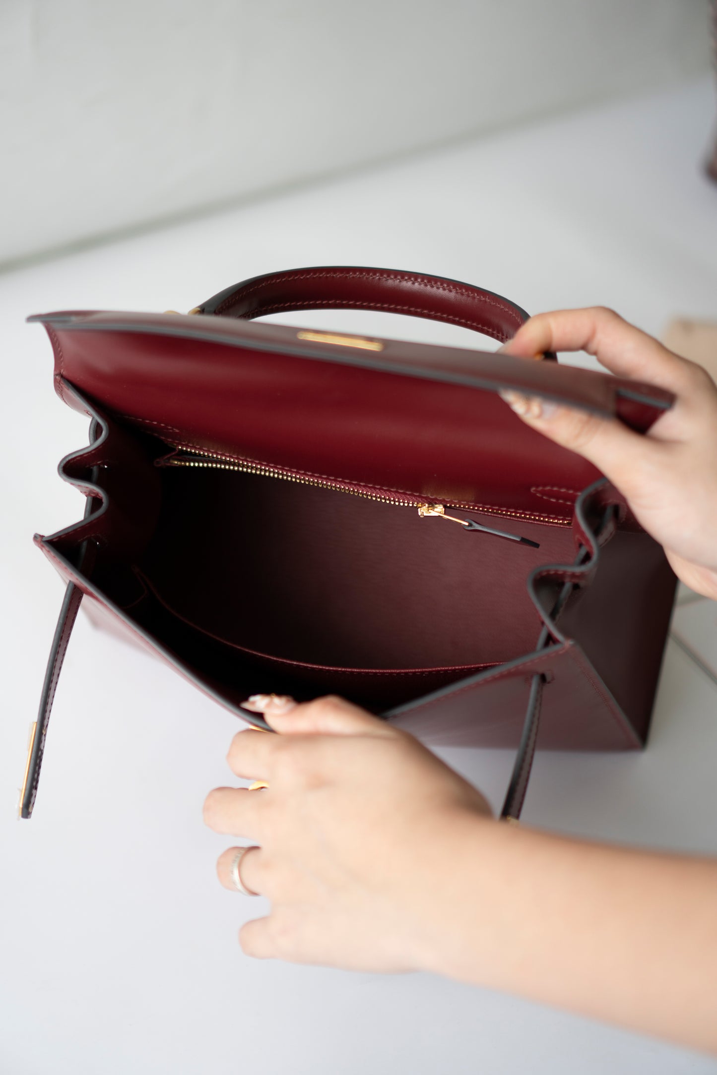 KL 25 – Rouge H Box Leather with Gold Hardware