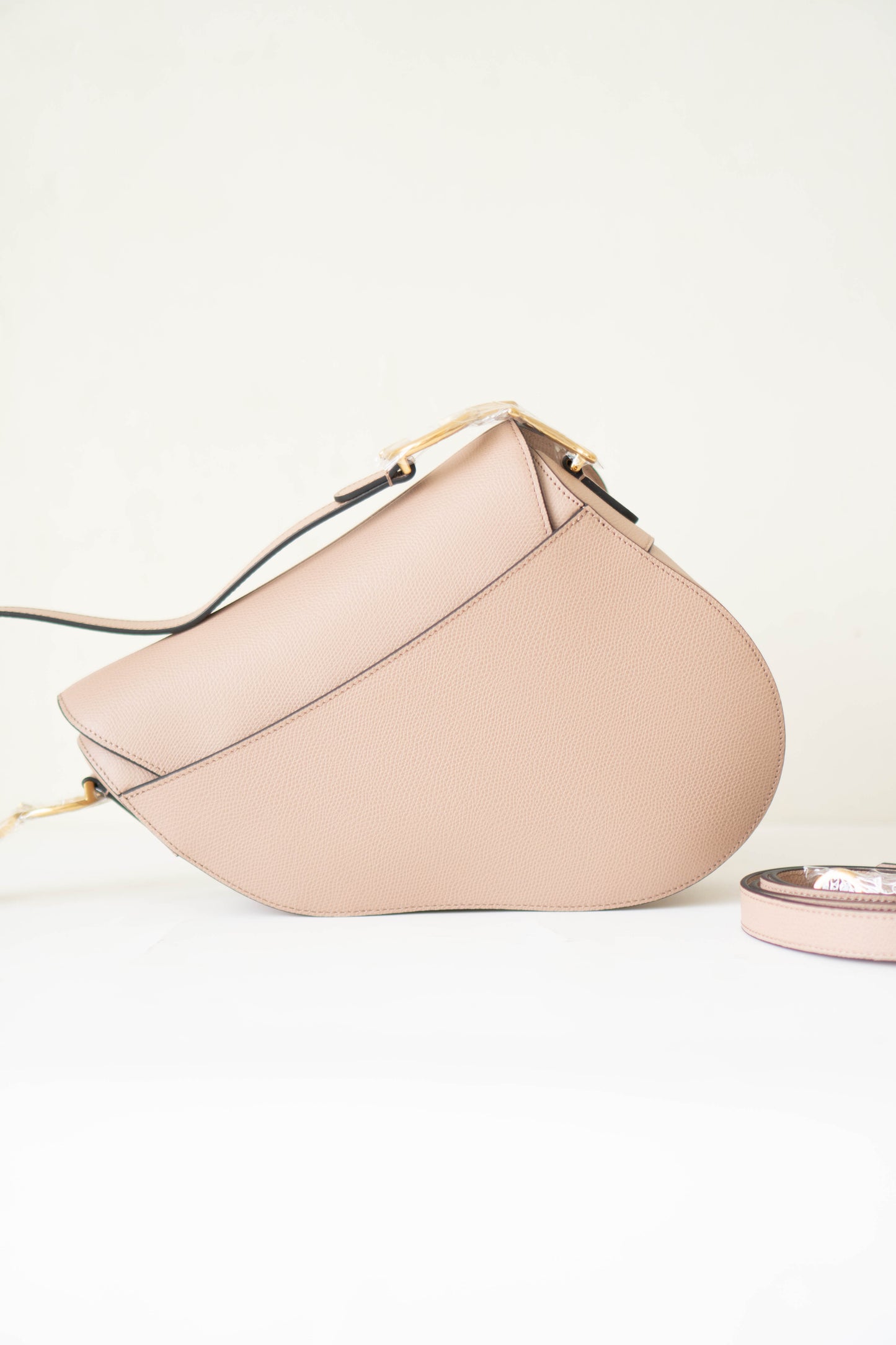Saddle in Beige Calfskin with Gold Hardware