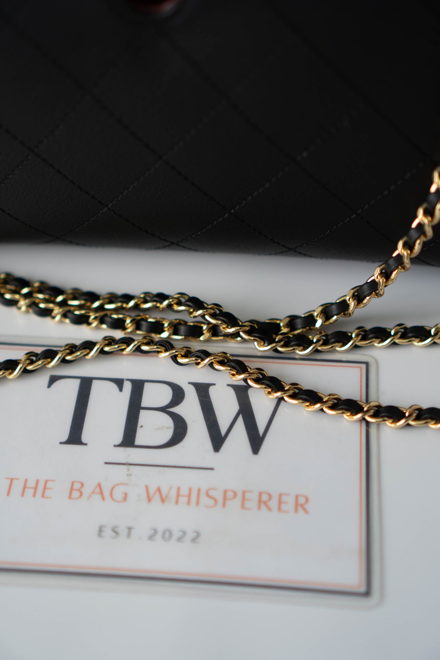 Chic Lady Quilted Triangle Tote – Black Grained Calfskin with Gold Hardware