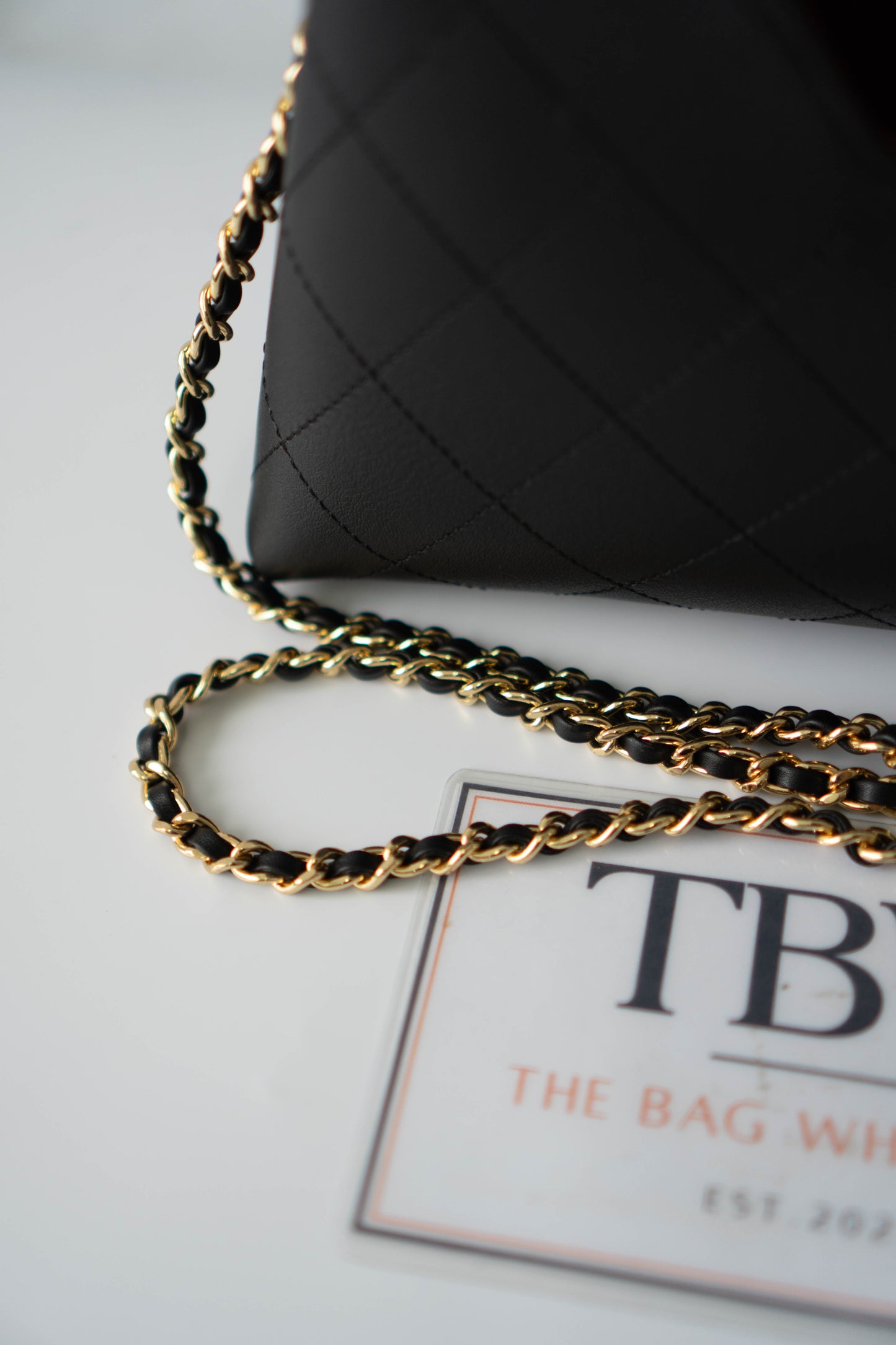 Chic Lady Quilted Triangle Tote – Black Grained Calfskin with Gold Hardware