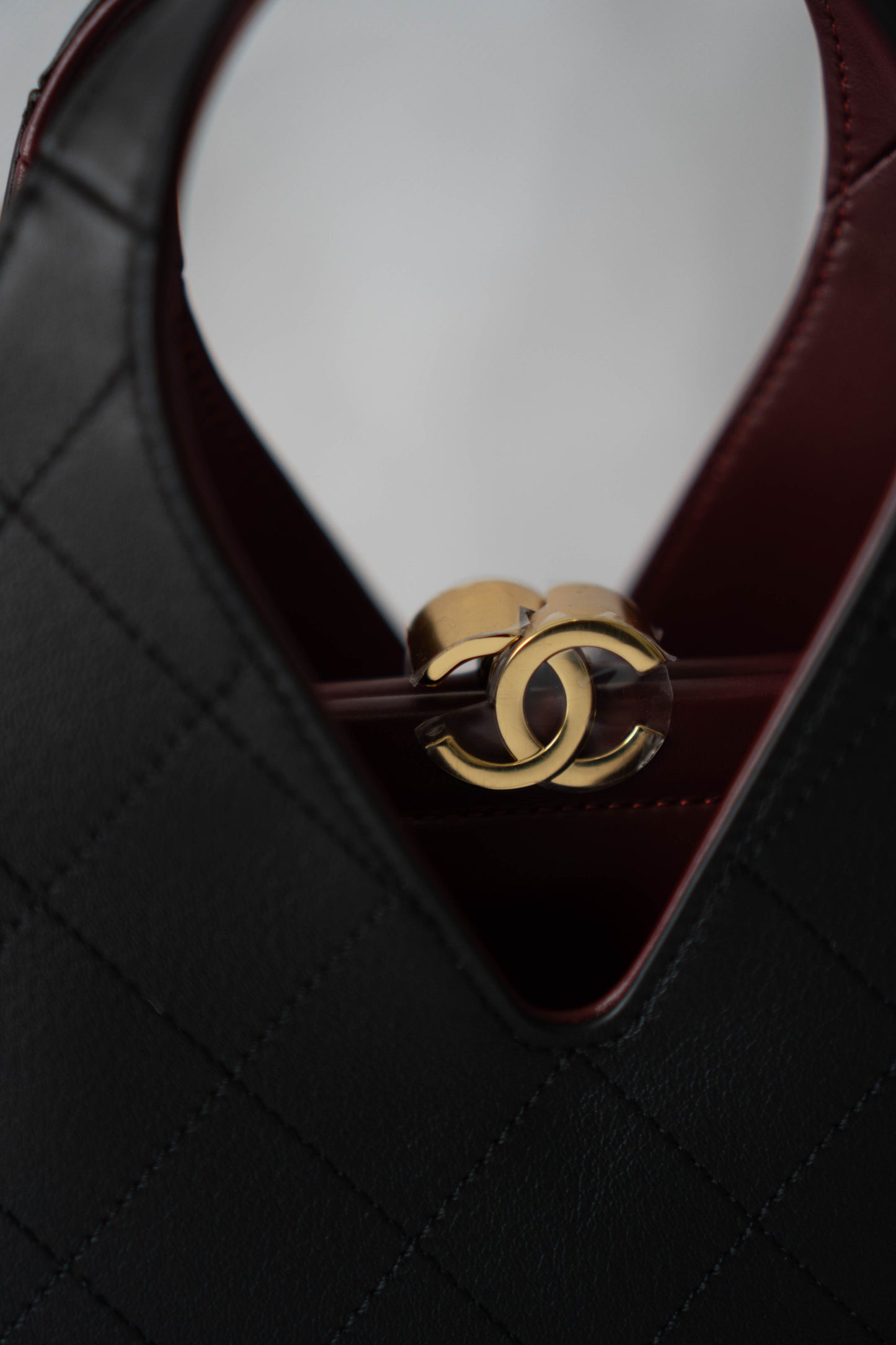 Chic Lady Quilted Triangle Tote – Black Grained Calfskin with Gold Hardware