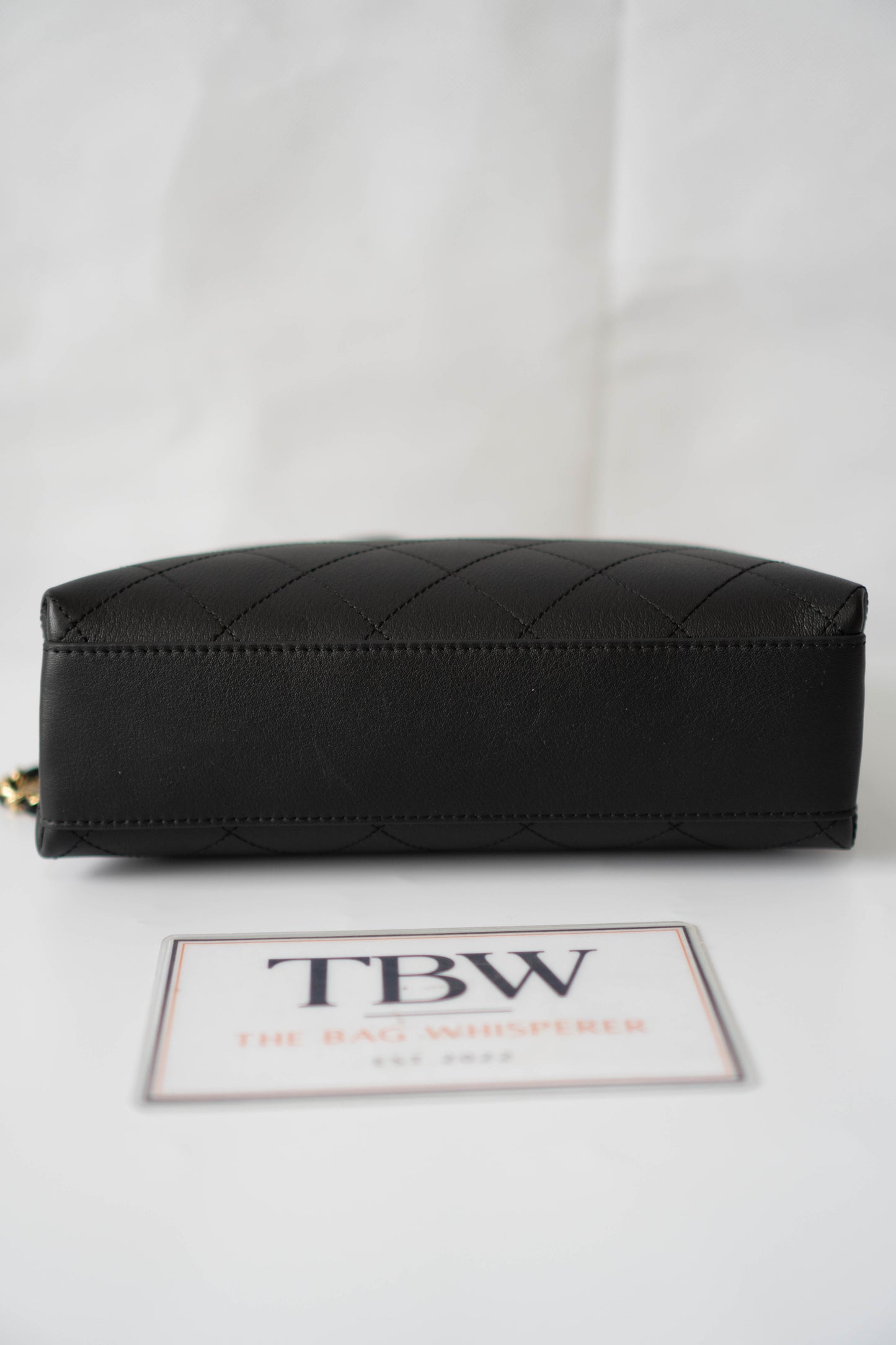 Chic Lady Quilted Triangle Tote – Black Grained Calfskin with Gold Hardware