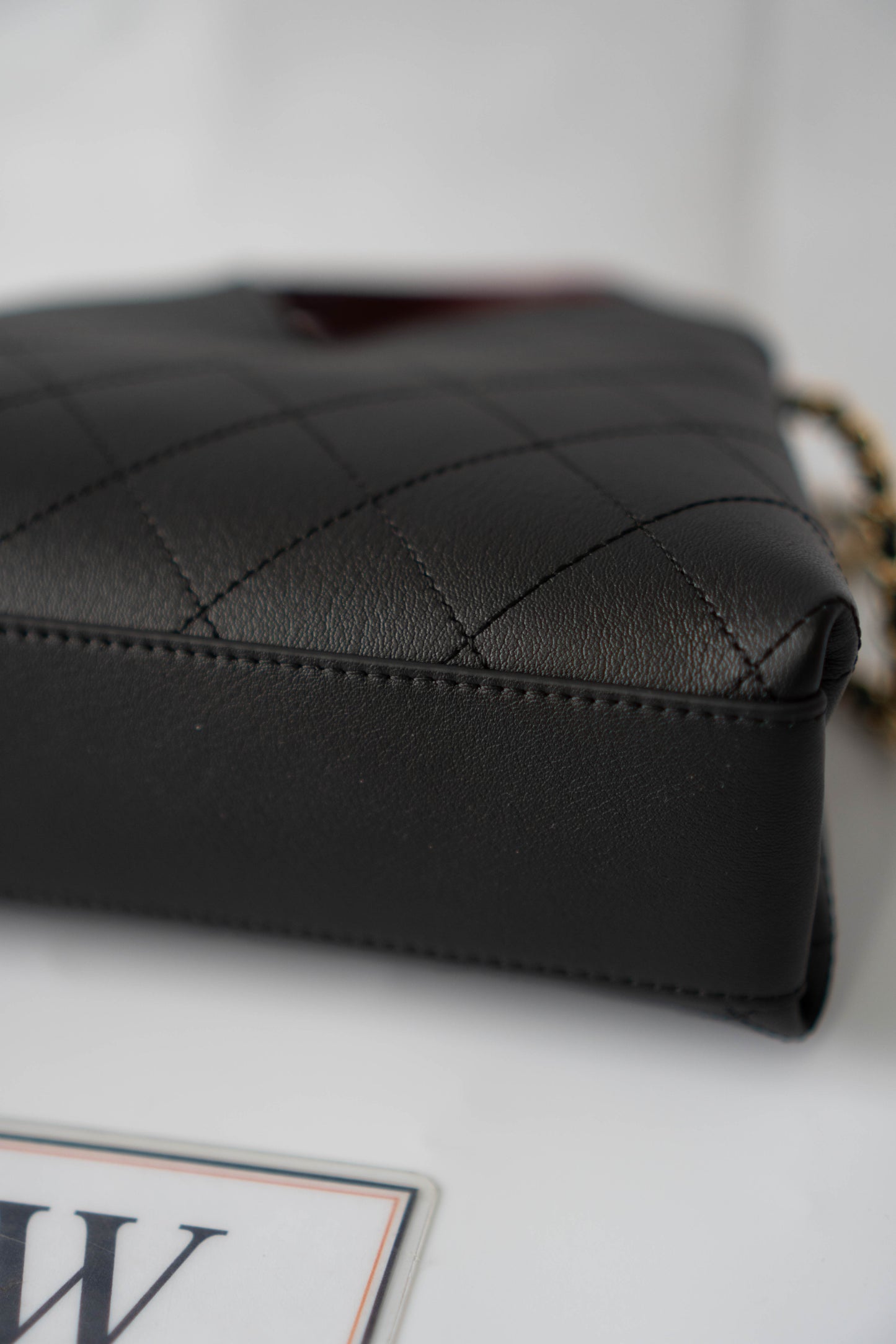 Chic Lady Quilted Triangle Tote – Black Grained Calfskin with Gold Hardware