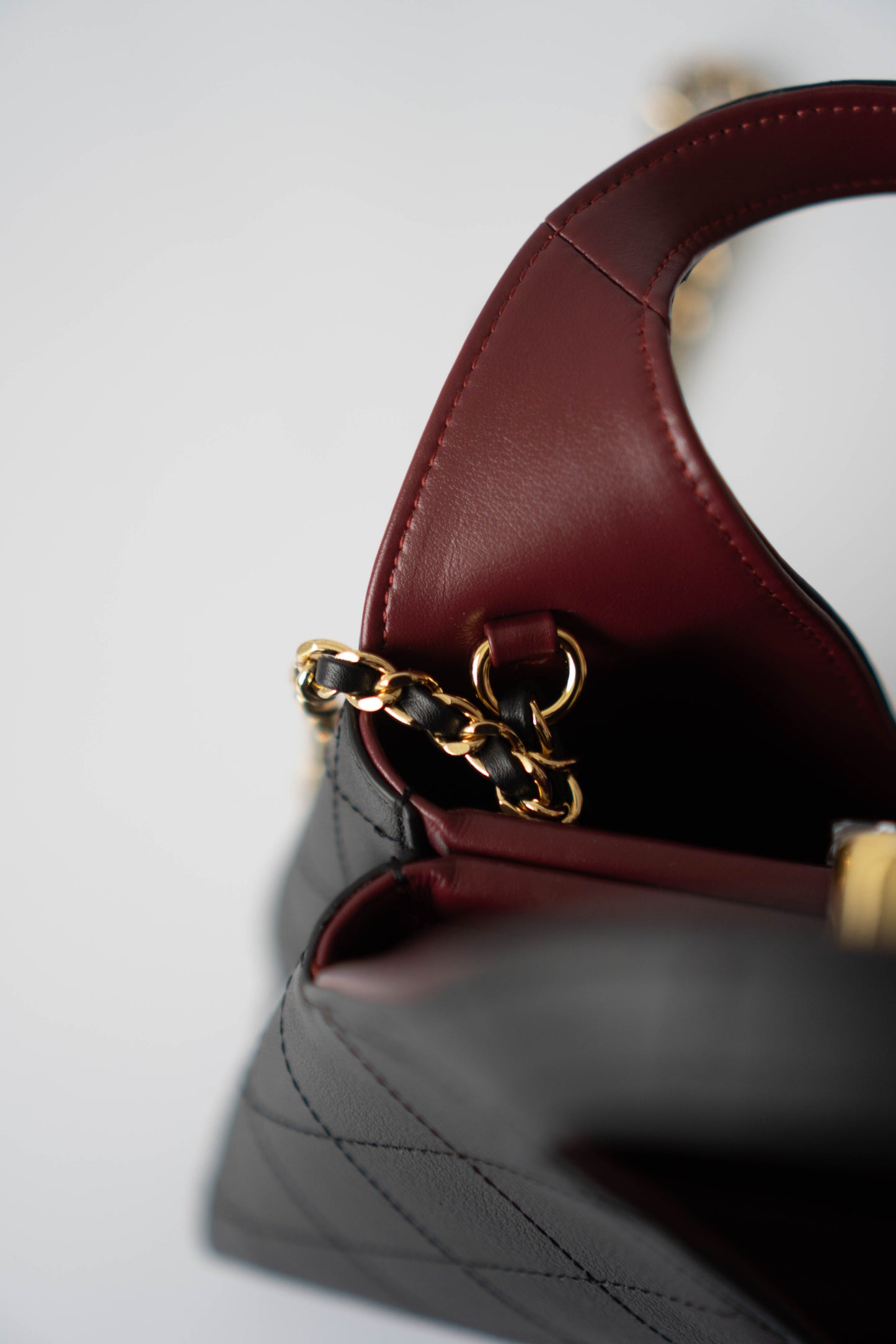 Chic Lady Quilted Triangle Tote – Black Grained Calfskin with Gold Hardware