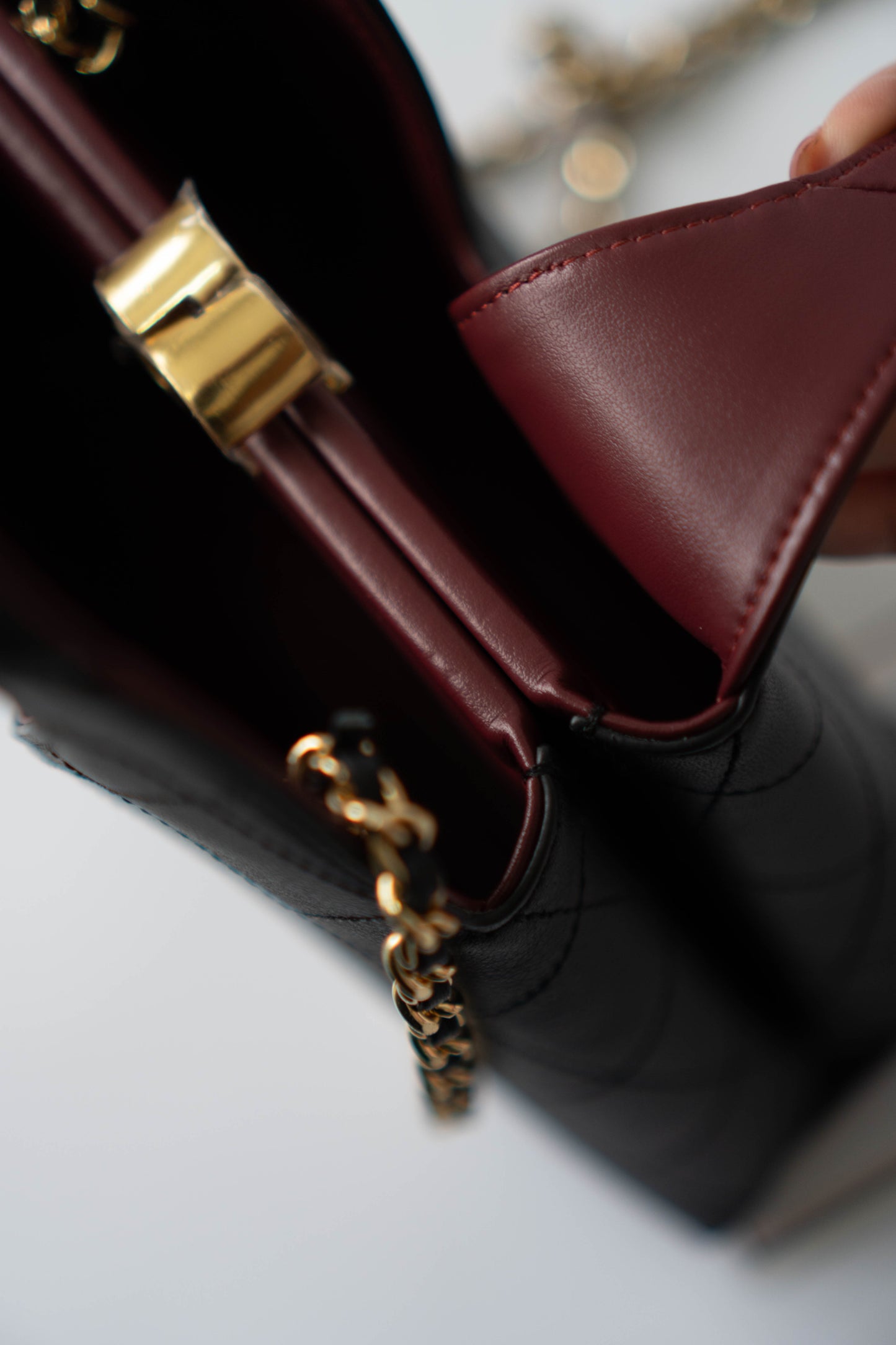 Chic Lady Quilted Triangle Tote – Black Grained Calfskin with Gold Hardware