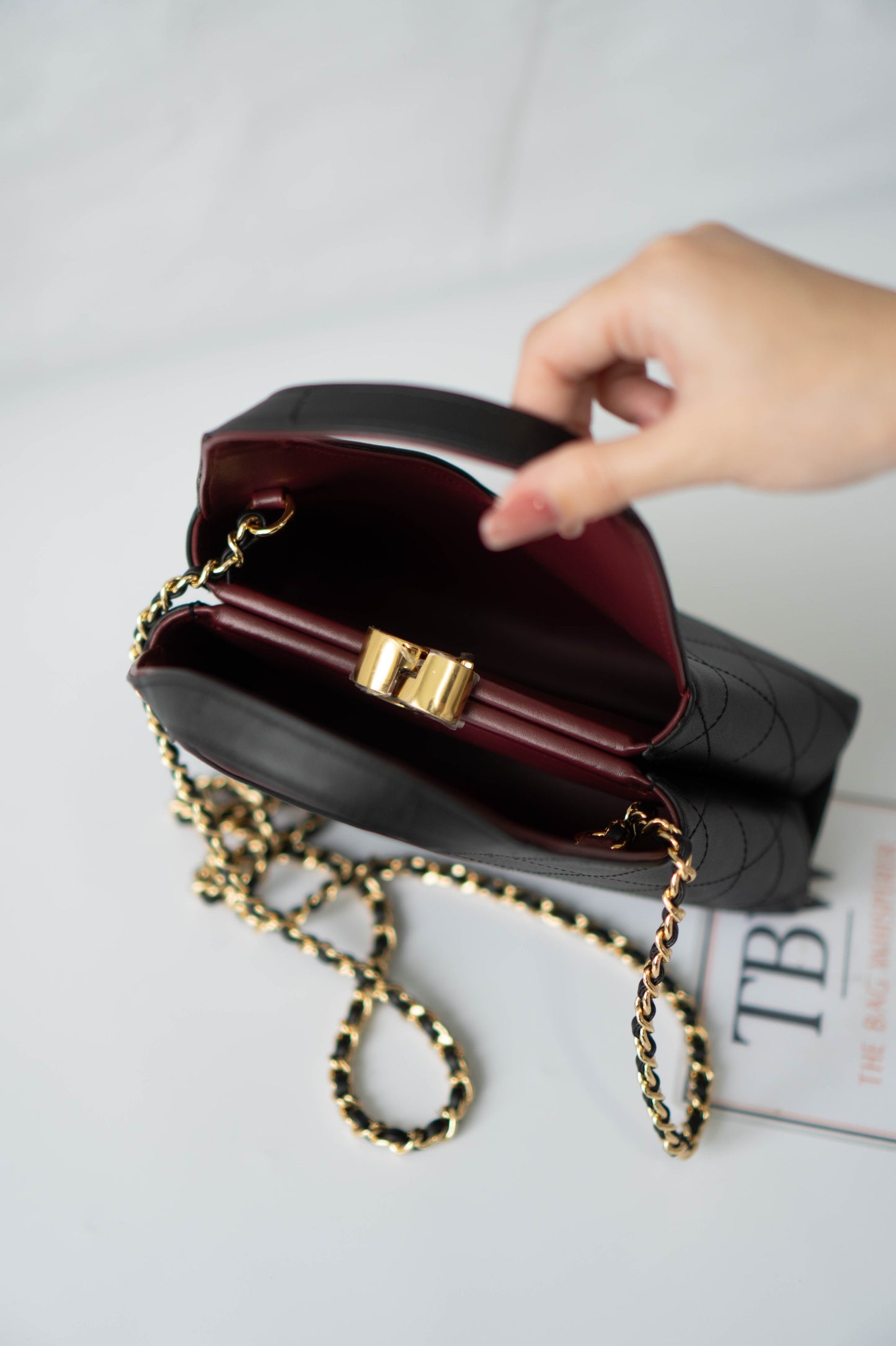 Chic Lady Quilted Triangle Tote – Black Grained Calfskin with Gold Hardware