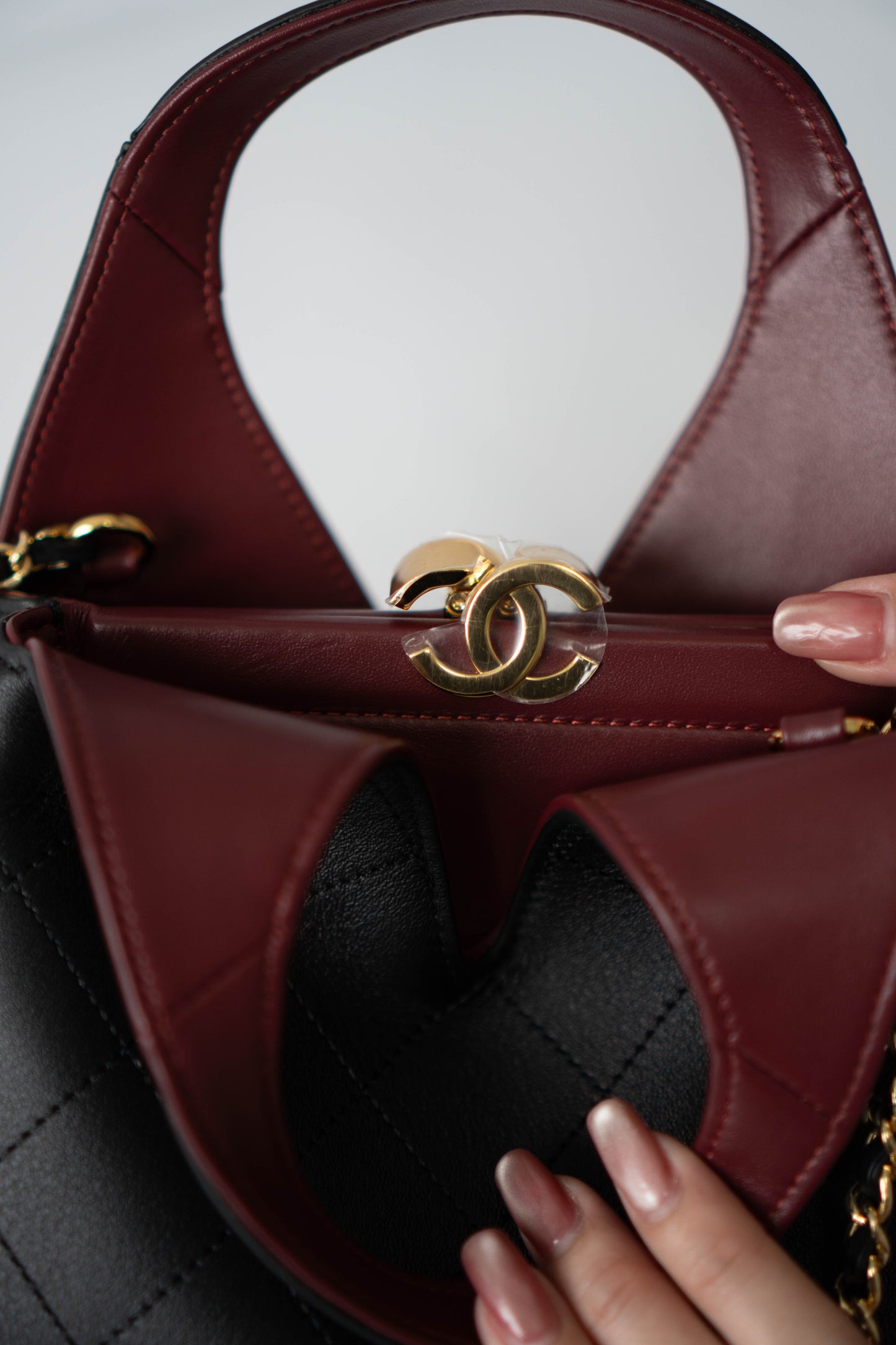 Chic Lady Quilted Triangle Tote – Black Grained Calfskin with Gold Hardware