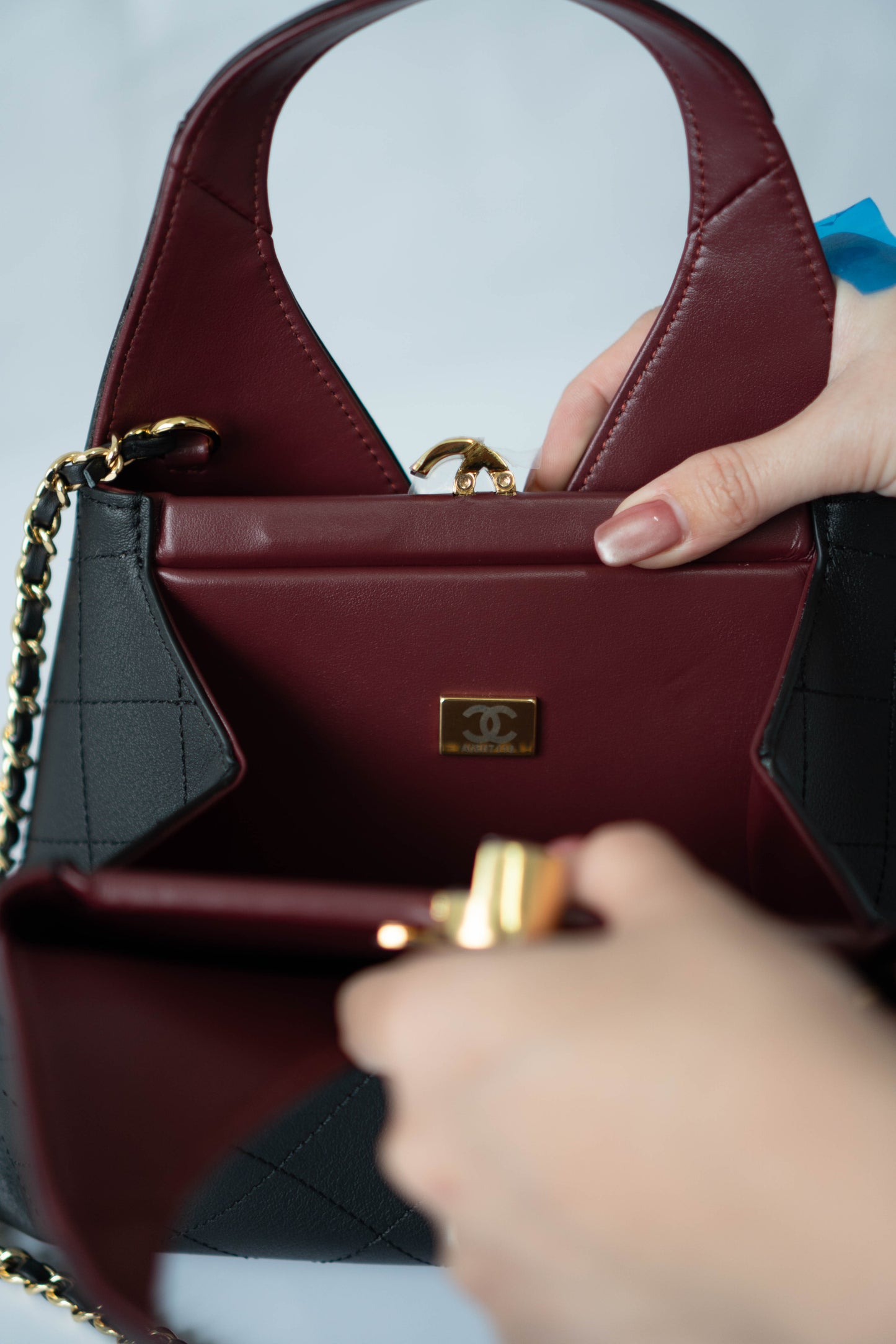 Chic Lady Quilted Triangle Tote – Black Grained Calfskin with Gold Hardware