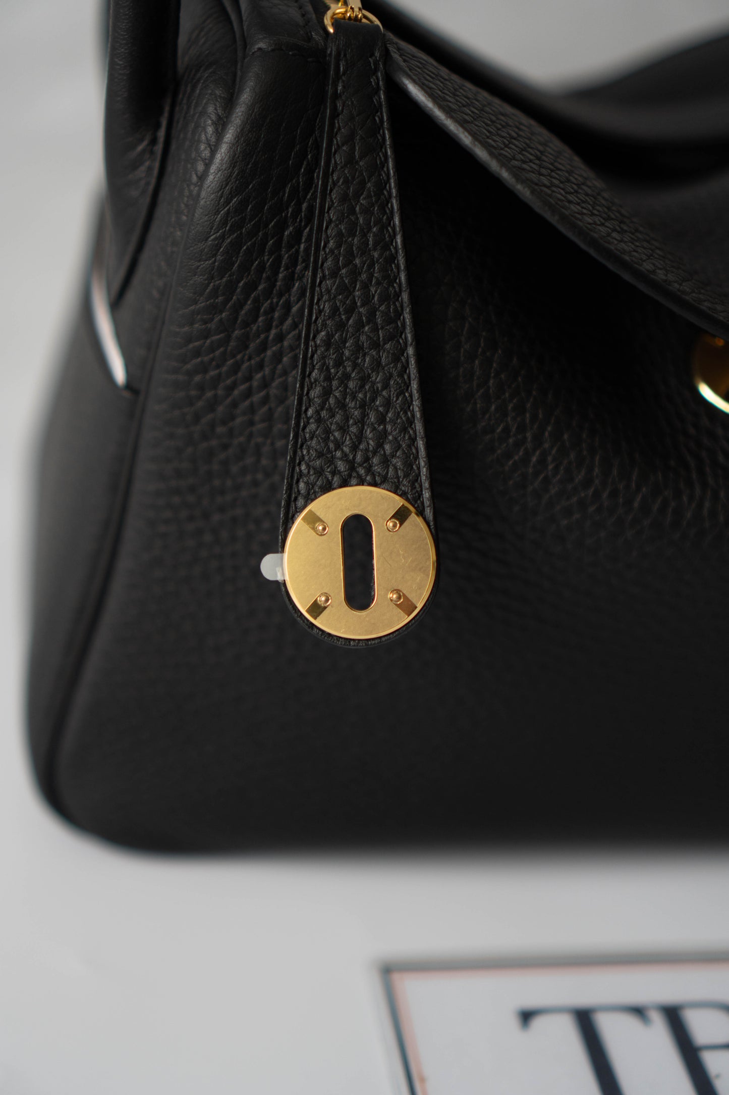 Lind 26 – Noir Clemence with Gold Hardware