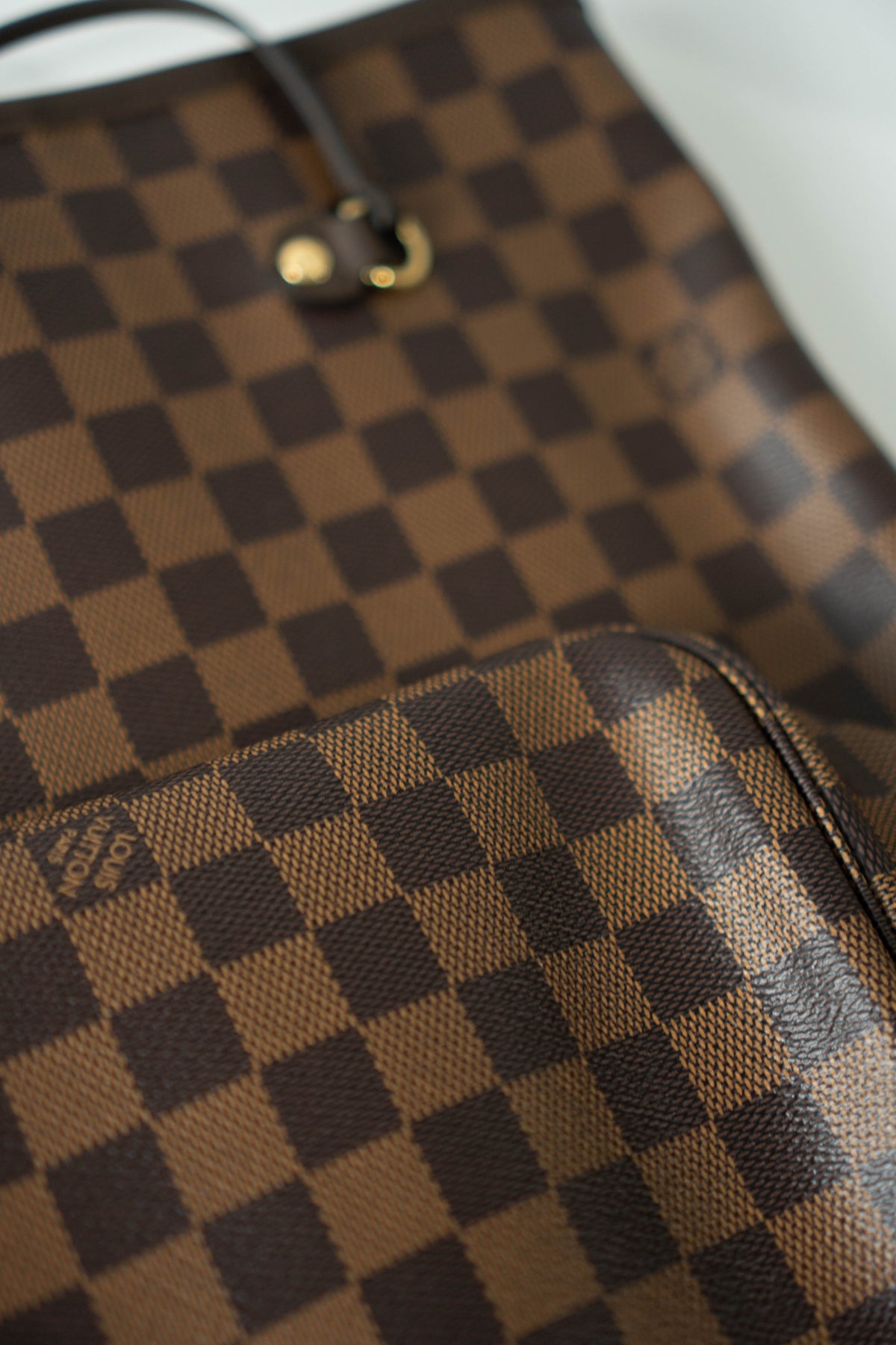 Neverfull MM – Damier Ebene Canvas with Red Interior
