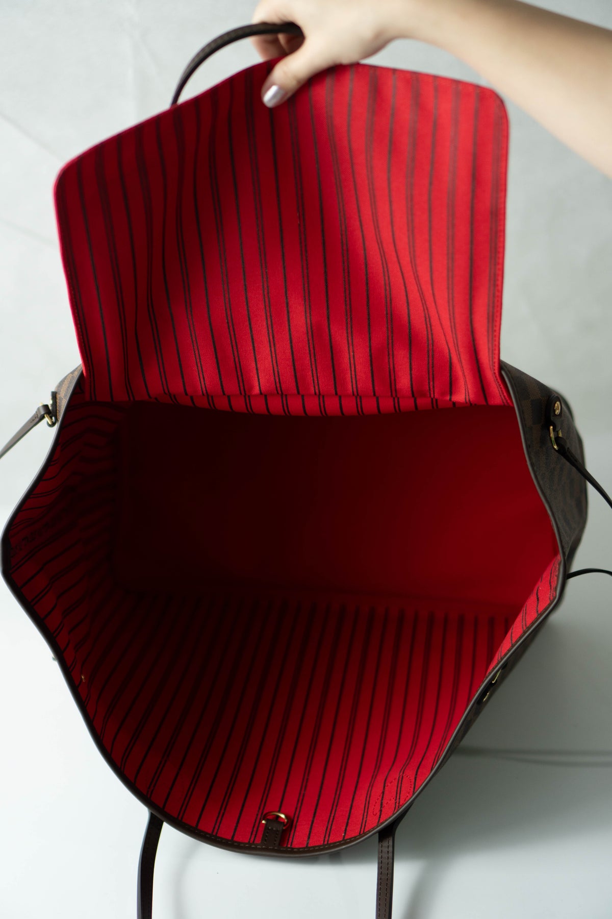 Neverfull MM – Damier Ebene Canvas with Red Interior