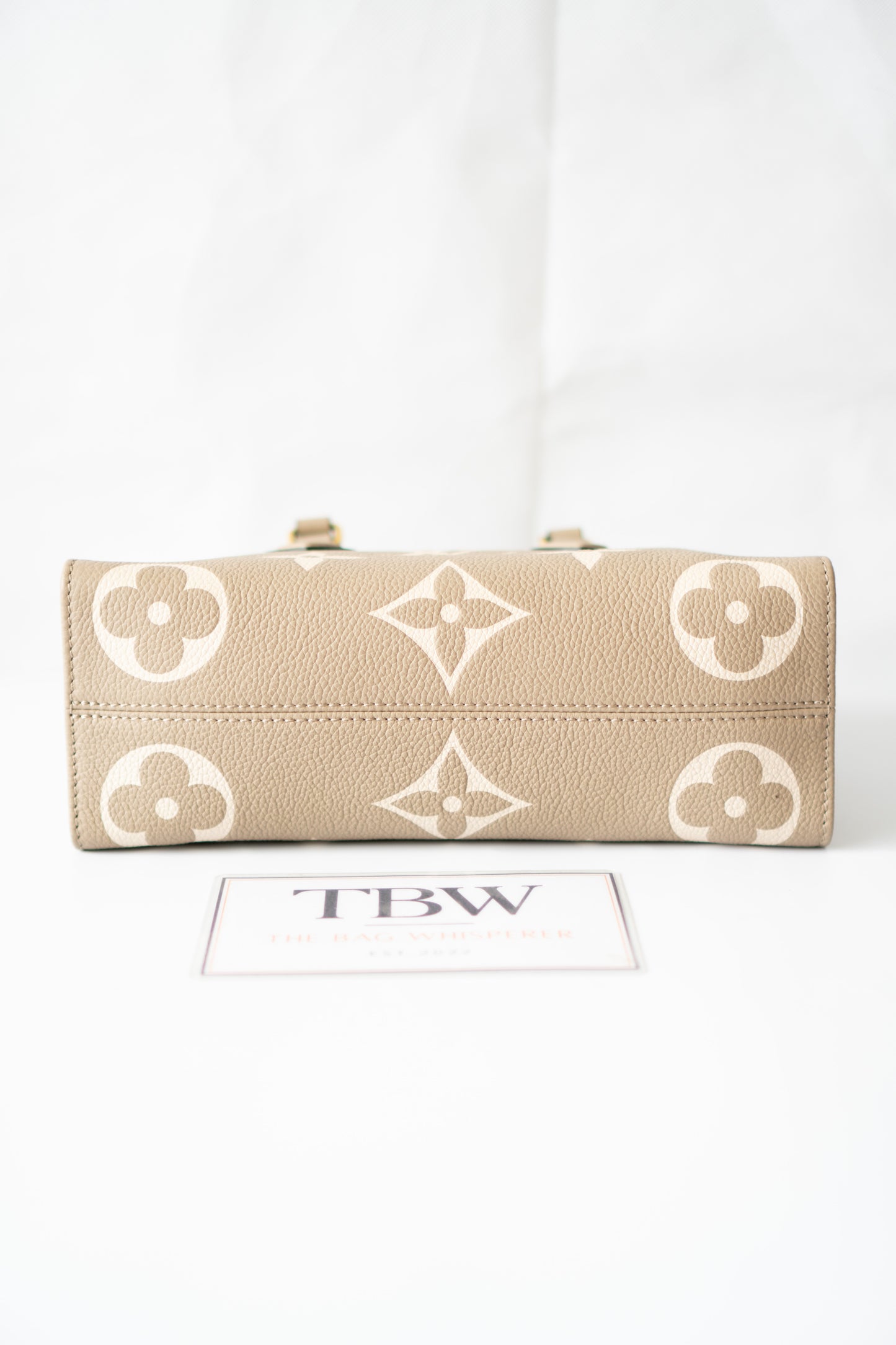 OnTheGo East-West Tote – Tourterelle Monogram Embossed Leather with Gold Hardware