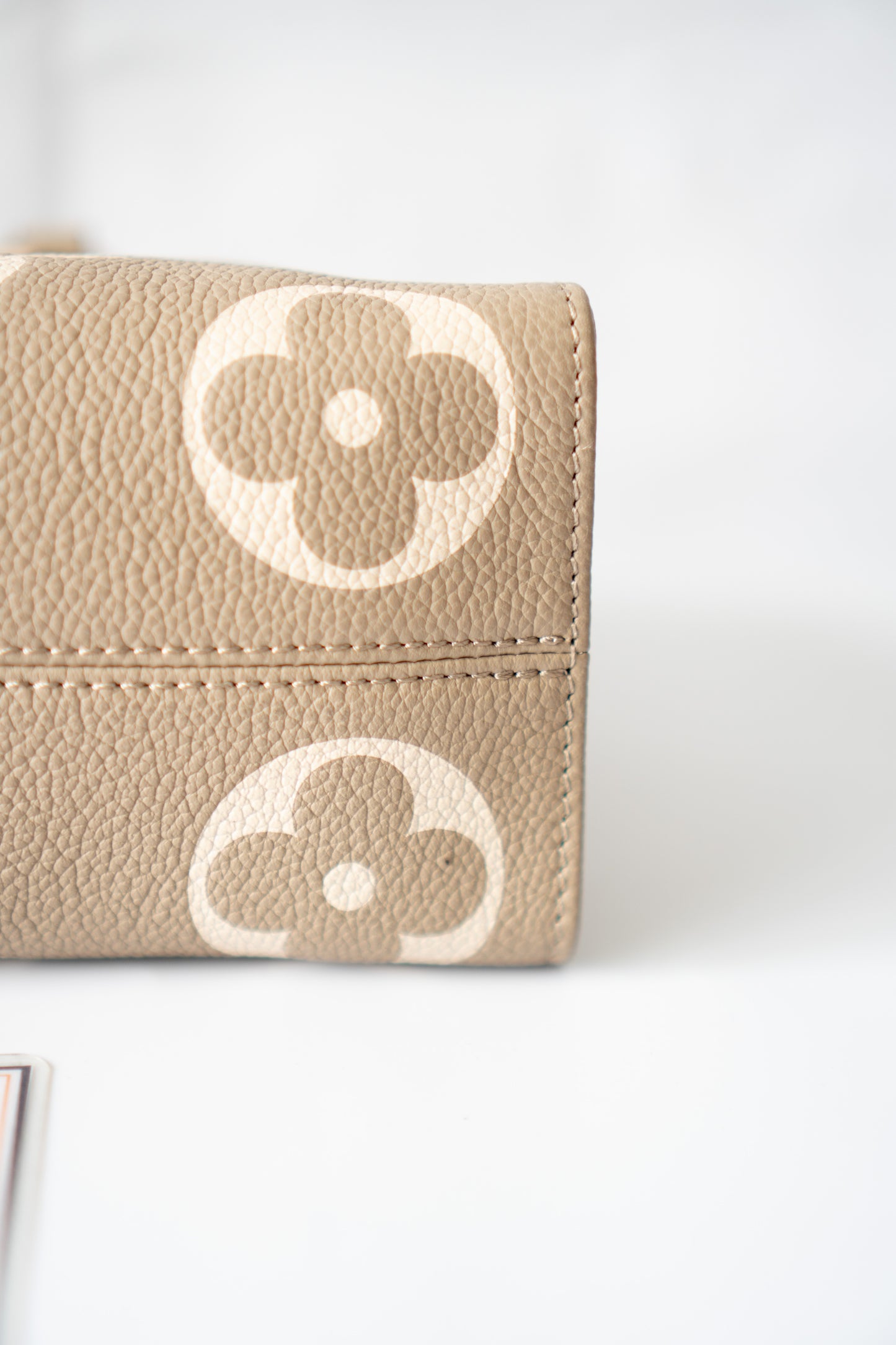 OnTheGo East-West Tote – Tourterelle Monogram Embossed Leather with Gold Hardware