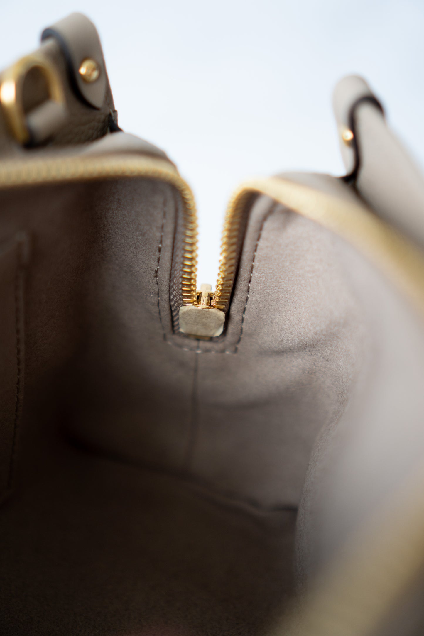 OnTheGo East-West Tote – Tourterelle Monogram Embossed Leather with Gold Hardware