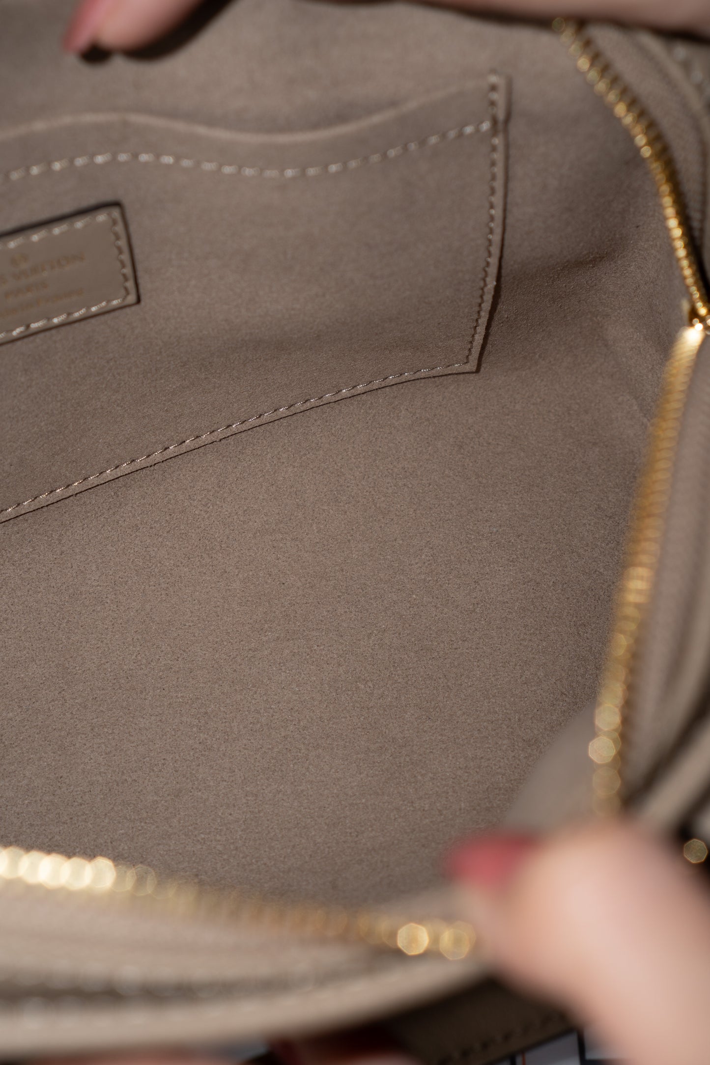 OnTheGo East-West Tote – Tourterelle Monogram Embossed Leather with Gold Hardware