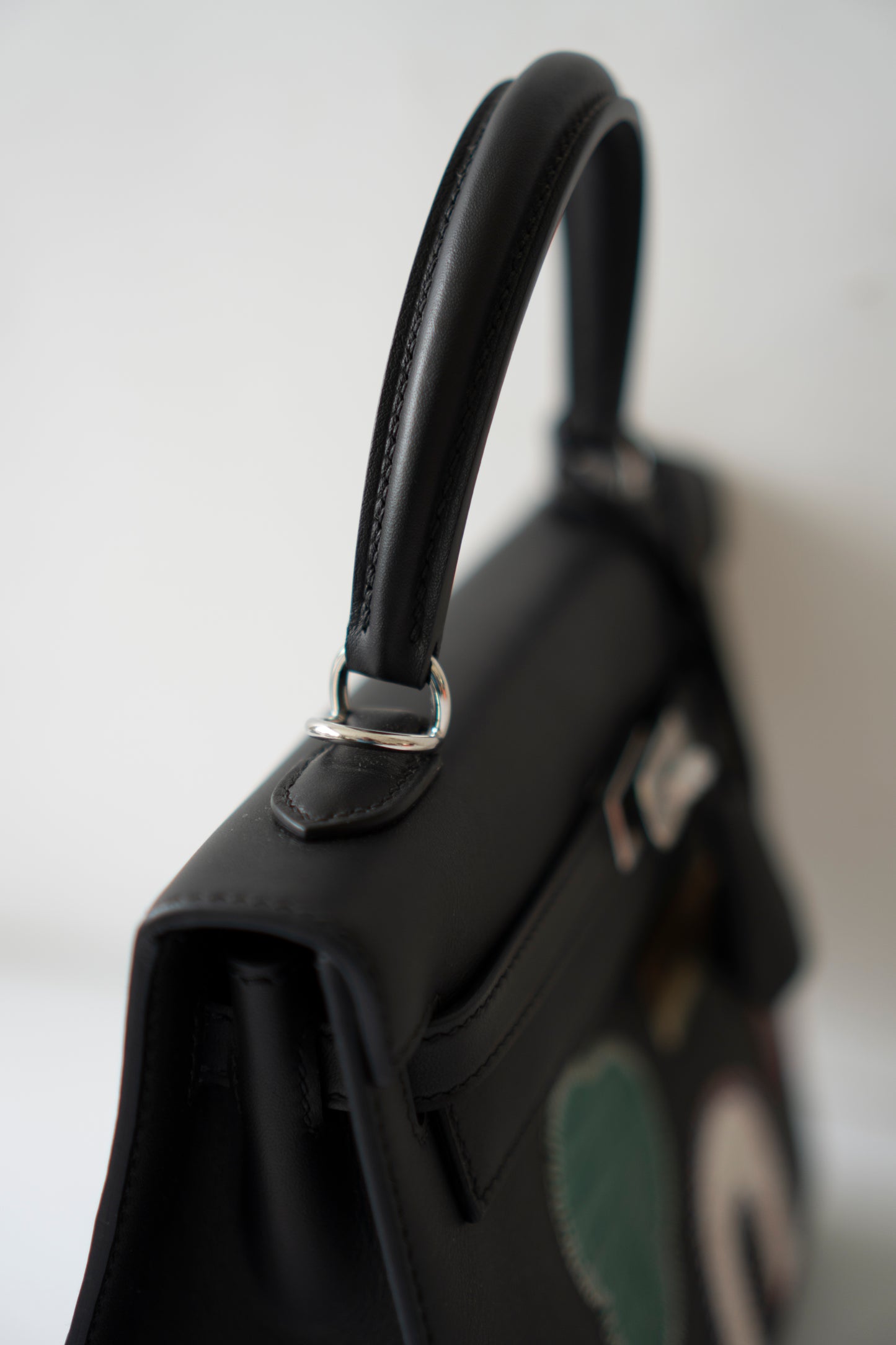 Kelly 25 – Black Volupto Leather with Exotic Croc Patches