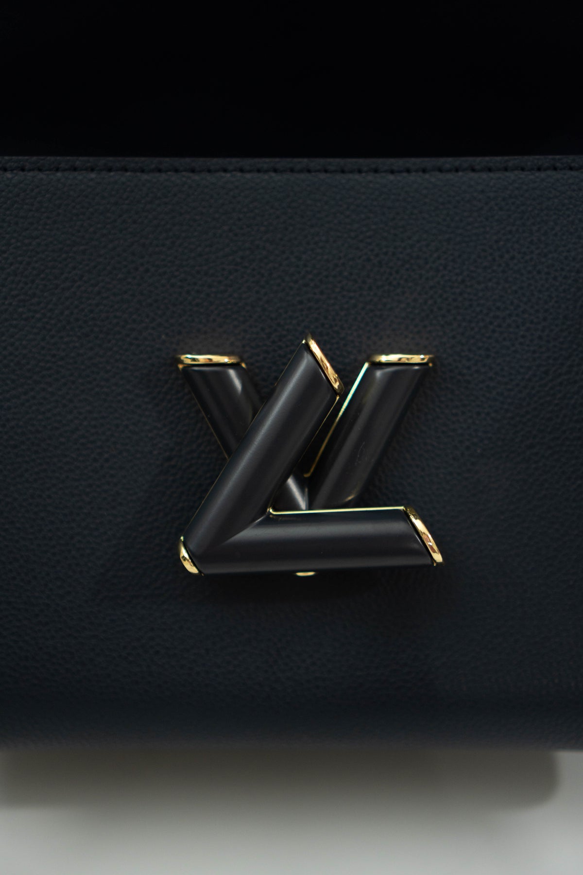 Twist MM Chain Bag – Dark Navy Monogram Empreinte & Epi Leather