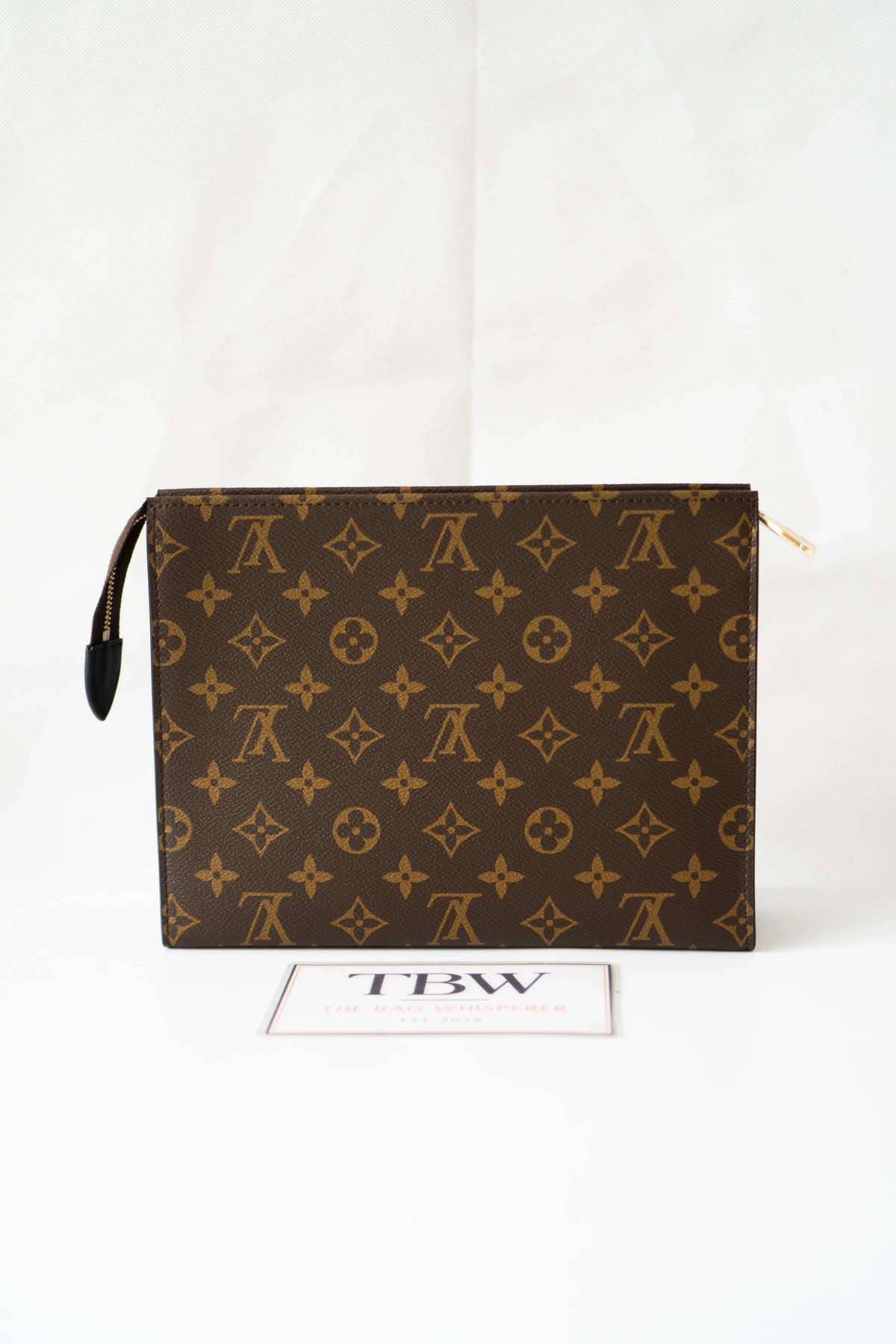 Structured Travel Pouch – Monogram Canvas with Black Leather Trim