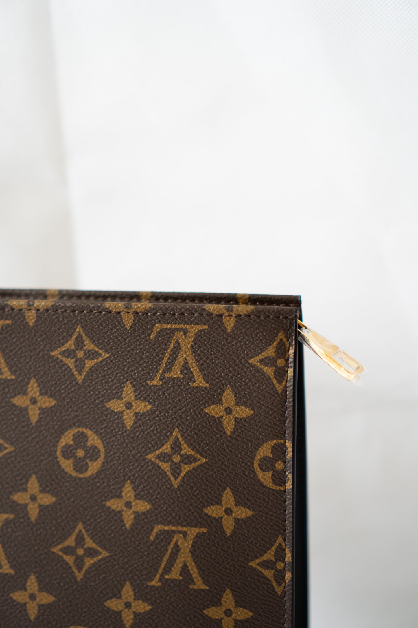 Structured Travel Pouch – Monogram Canvas with Black Leather Trim
