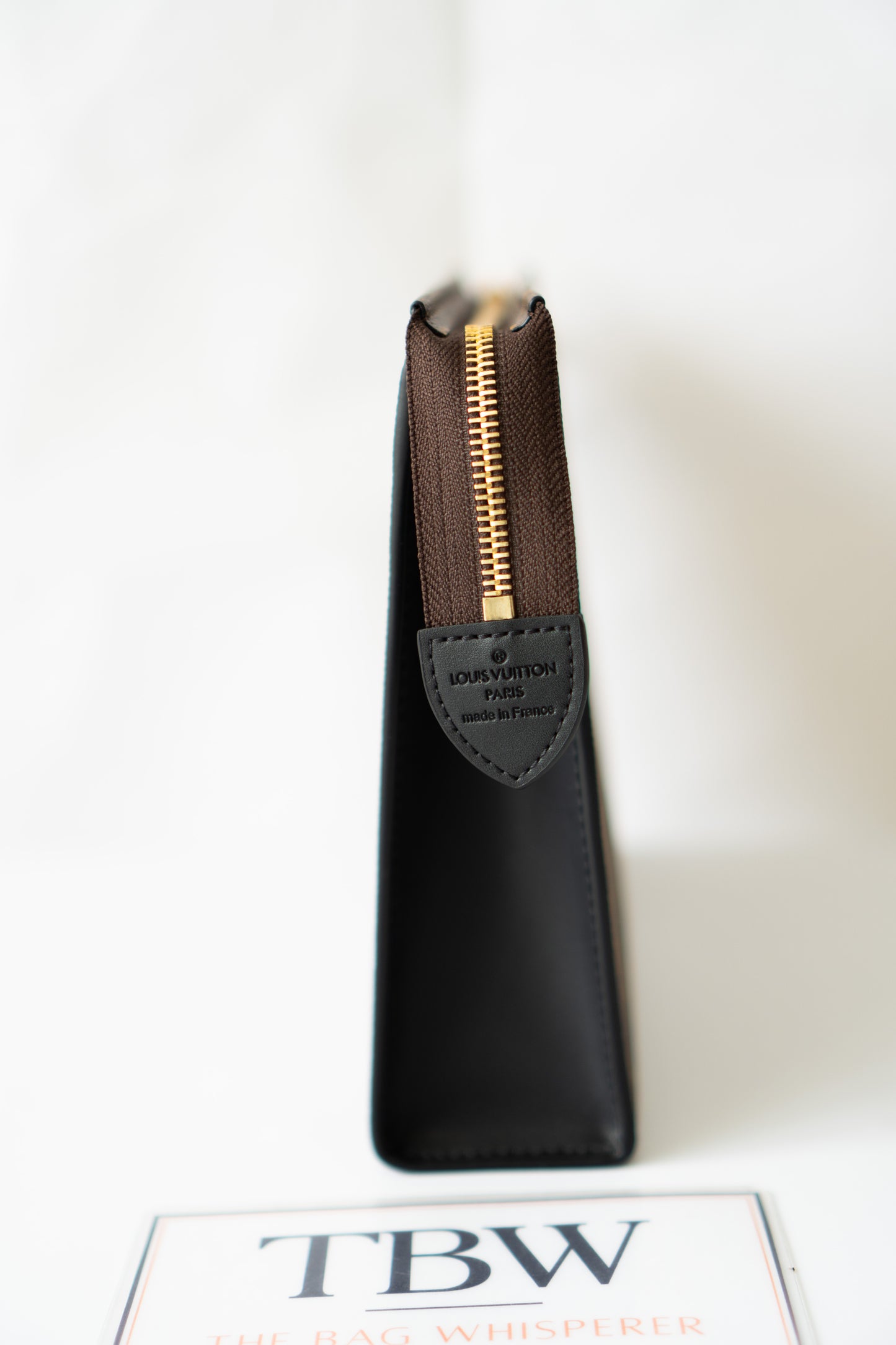 Structured Travel Pouch – Monogram Canvas with Black Leather Trim