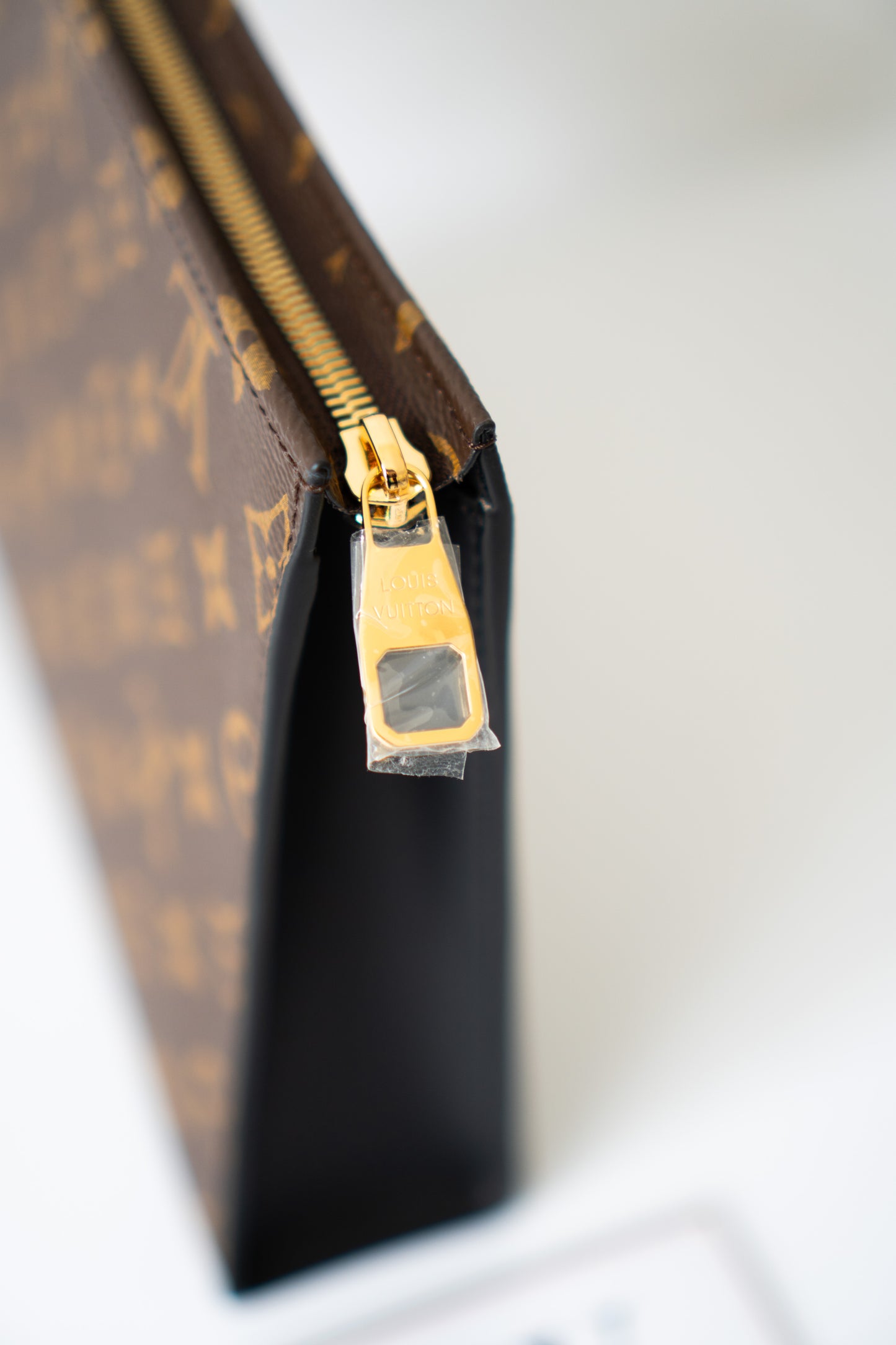 Structured Travel Pouch – Monogram Canvas with Black Leather Trim
