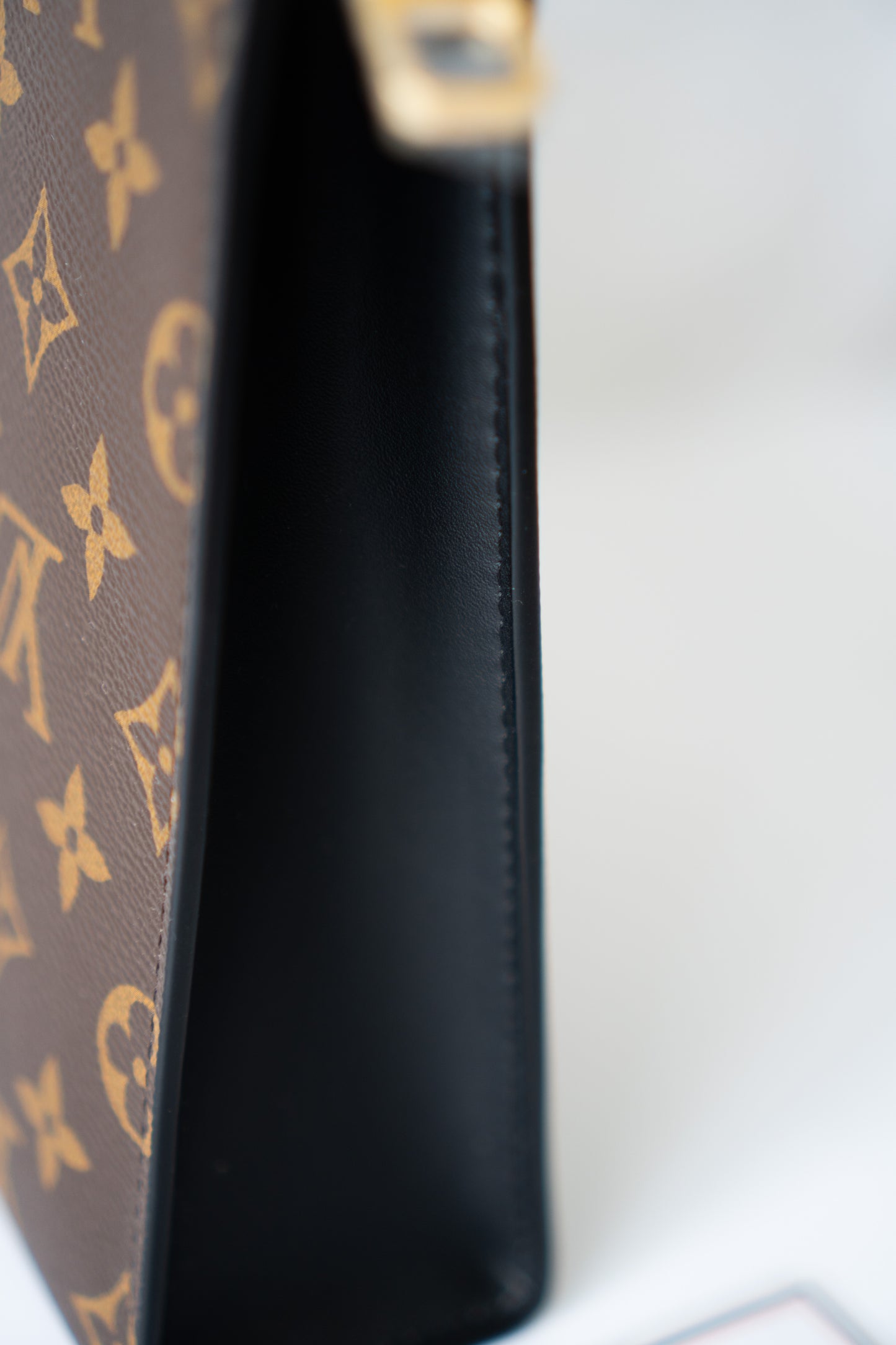 Structured Travel Pouch – Monogram Canvas with Black Leather Trim